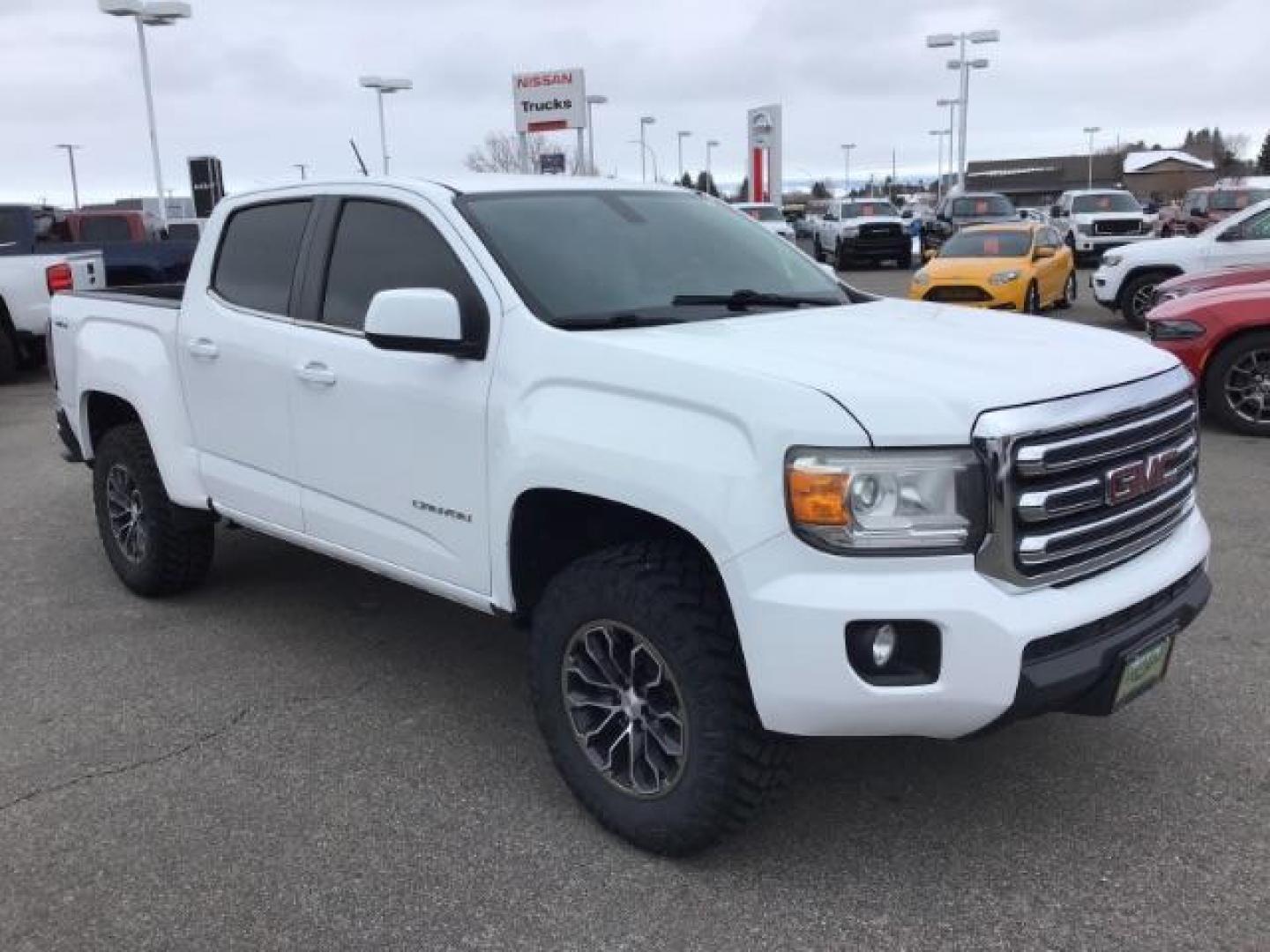 2015 Summit White /Jet Black GMC Canyon SLE Crew Cab 4WD Short Box (1GTG6BE38F1) with an 3.6L V6 DOHC 24V engine, 6-Speed Automatic transmission, located at 1235 N Woodruff Ave., Idaho Falls, 83401, (208) 523-1053, 43.507172, -112.000488 - This 2015 GMC Canyon SLE 4x4, has the 3.6L motor. It has 130,000 miles. Comes with cloth interior, blue tooth audio, back up camera, cruise control, power windows and locks. At Timberline Auto it is always easy to find a great deal on your next vehicle! Our experienced sales staff can help find the - Photo#6