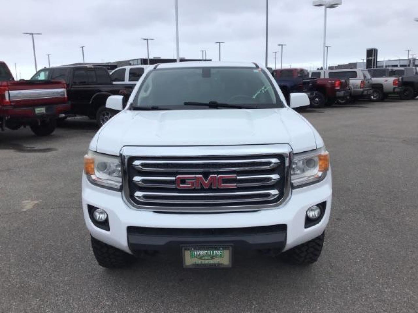 2015 Summit White /Jet Black GMC Canyon SLE Crew Cab 4WD Short Box (1GTG6BE38F1) with an 3.6L V6 DOHC 24V engine, 6-Speed Automatic transmission, located at 1235 N Woodruff Ave., Idaho Falls, 83401, (208) 523-1053, 43.507172, -112.000488 - This 2015 GMC Canyon SLE 4x4, has the 3.6L motor. It has 130,000 miles. Comes with cloth interior, blue tooth audio, back up camera, cruise control, power windows and locks. At Timberline Auto it is always easy to find a great deal on your next vehicle! Our experienced sales staff can help find the - Photo#7