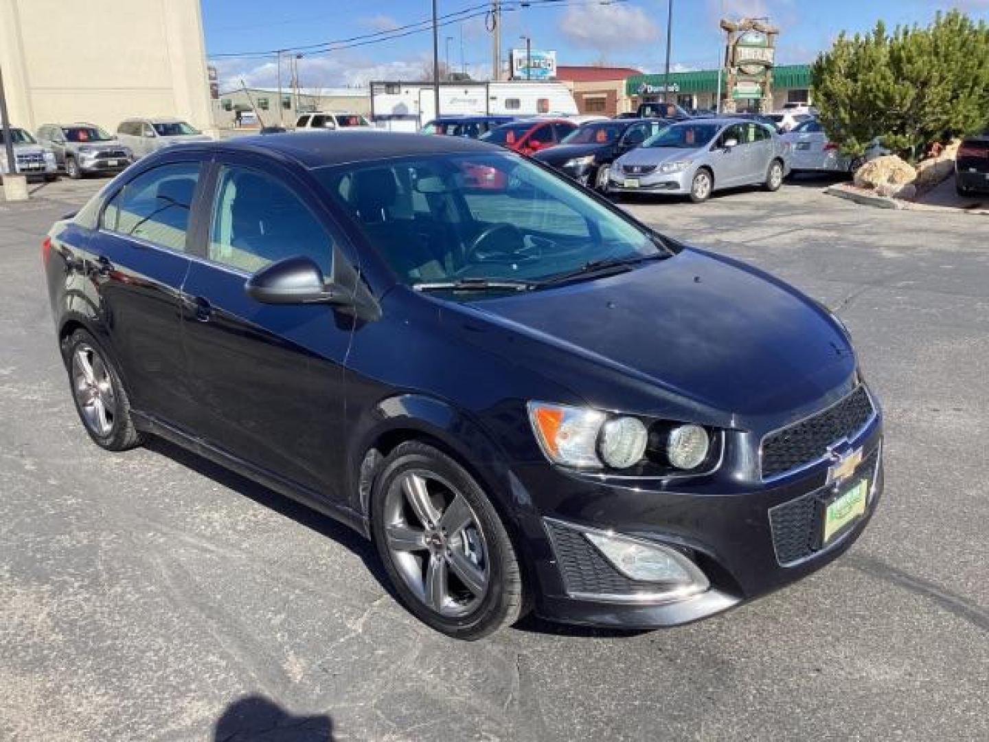 2015 Black Granite Metallic /Jet Black Chevrolet Sonic RS Auto Sedan (1G1JG5SBXF4) with an 1.4L L4 DOHC 24V TURBO engine, 6-Speed Automatic transmission, located at 1235 N Woodruff Ave., Idaho Falls, 83401, (208) 523-1053, 43.507172, -112.000488 - The 2015 Chevrolet Sonic RS is a sporty version of the Chevrolet Sonic, a subcompact car. Here are some of the features you might find on the 2015 Chevrolet Sonic RS: Turbocharged Engine: The Sonic RS is typically equipped with a turbocharged 1.4-liter inline-four engine, which delivers more power - Photo#6