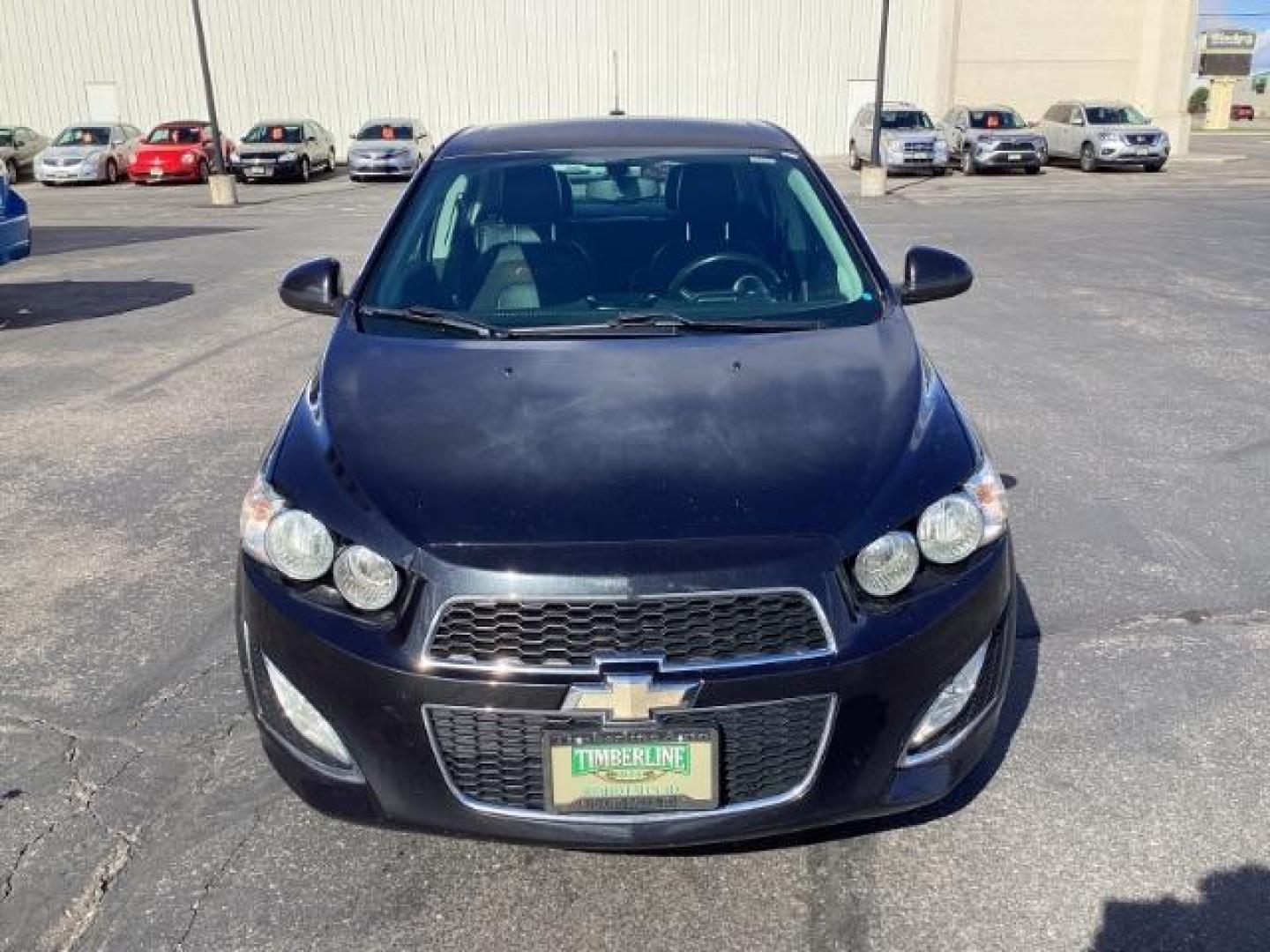 2015 Black Granite Metallic /Jet Black Chevrolet Sonic RS Auto Sedan (1G1JG5SBXF4) with an 1.4L L4 DOHC 24V TURBO engine, 6-Speed Automatic transmission, located at 1235 N Woodruff Ave., Idaho Falls, 83401, (208) 523-1053, 43.507172, -112.000488 - The 2015 Chevrolet Sonic RS is a sporty version of the Chevrolet Sonic, a subcompact car. Here are some of the features you might find on the 2015 Chevrolet Sonic RS: Turbocharged Engine: The Sonic RS is typically equipped with a turbocharged 1.4-liter inline-four engine, which delivers more power - Photo#7