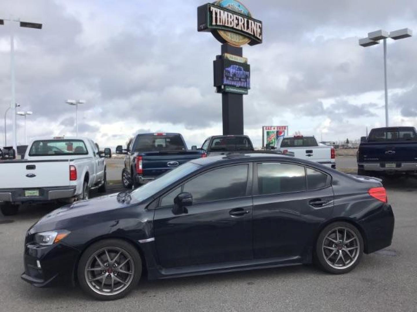 2016 BLACK /Carbon Black, leather Subaru WRX STI Limited (JF1VA2Z60G9) with an 2.5L H4 DOHC 16V engine, 6-Speed Manual transmission, located at 1235 N Woodruff Ave., Idaho Falls, 83401, (208) 523-1053, 43.507172, -112.000488 - This 2016 Subaru WRX STI, only has 71,945 miles. It has a manual transmission. Comes with cloth seats, heated seats, driver power seat, steering wheel controls, back up camera, blue tooth audio, keyless remote, and power windows and locks. At Timberline Auto it is always easy to find a great deal on - Photo#1