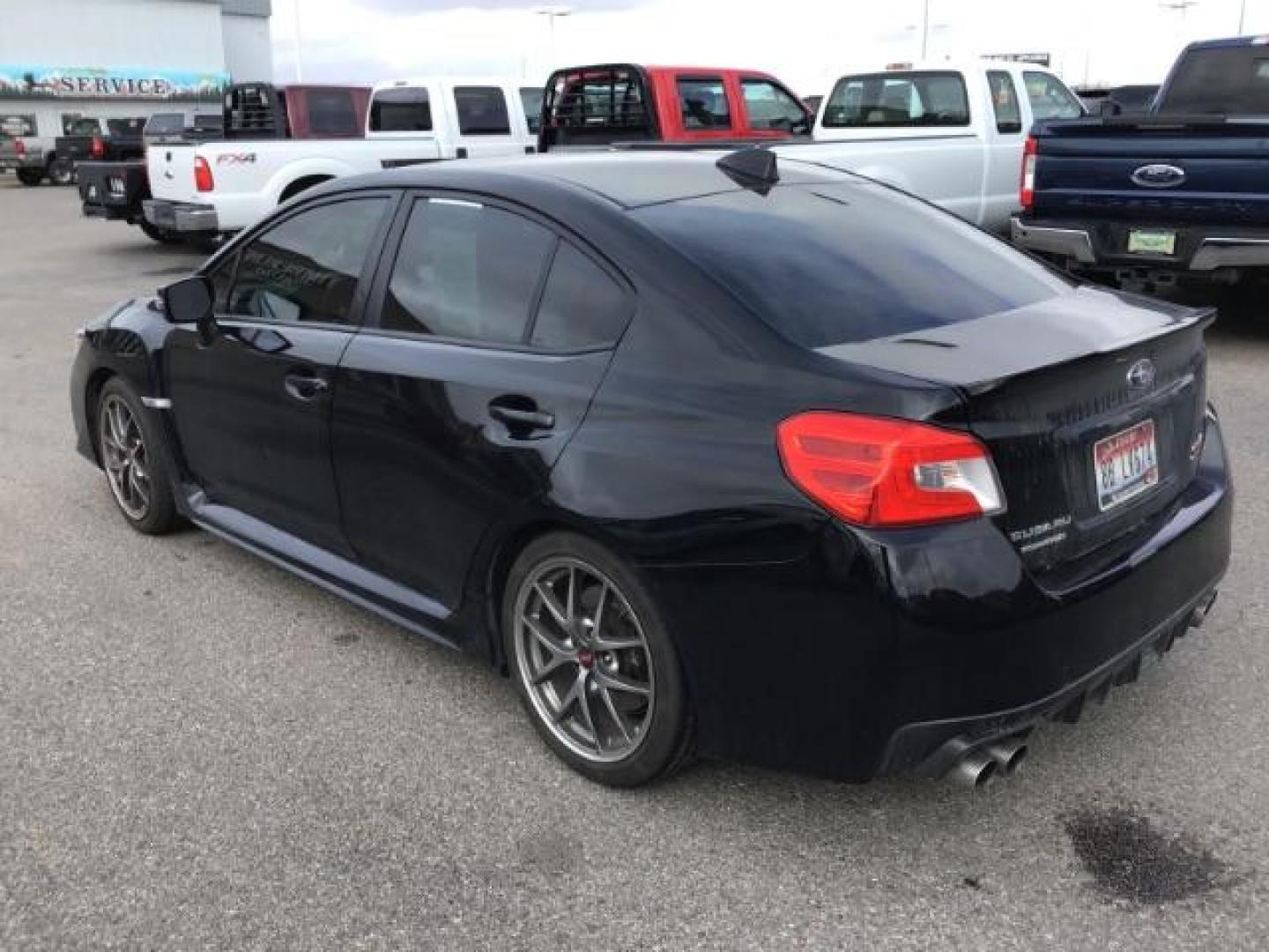 2016 BLACK /Carbon Black, leather Subaru WRX STI Limited (JF1VA2Z60G9) with an 2.5L H4 DOHC 16V engine, 6-Speed Manual transmission, located at 1235 N Woodruff Ave., Idaho Falls, 83401, (208) 523-1053, 43.507172, -112.000488 - This 2016 Subaru WRX STI, only has 71,945 miles. It has a manual transmission. Comes with cloth seats, heated seats, driver power seat, steering wheel controls, back up camera, blue tooth audio, keyless remote, and power windows and locks. At Timberline Auto it is always easy to find a great deal on - Photo#2