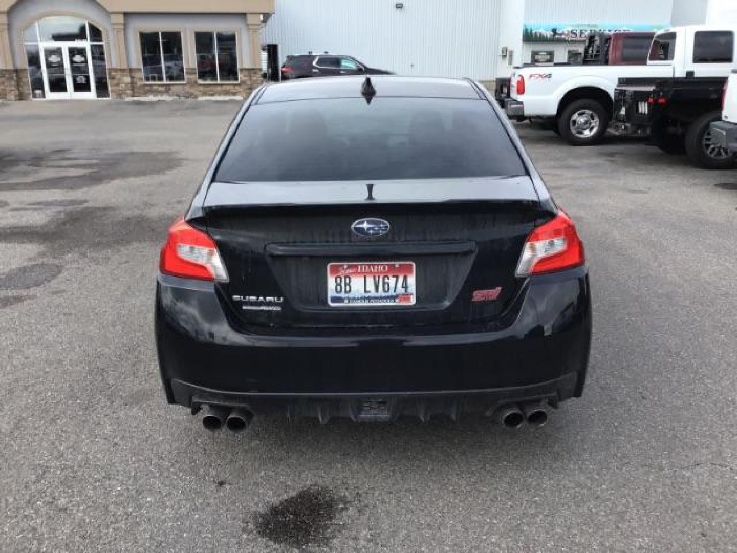 2016 BLACK /Carbon Black, leather Subaru WRX STI Limited (JF1VA2Z60G9) with an 2.5L H4 DOHC 16V engine, 6-Speed Manual transmission, located at 1235 N Woodruff Ave., Idaho Falls, 83401, (208) 523-1053, 43.507172, -112.000488 - This 2016 Subaru WRX STI, only has 71,945 miles. It has a manual transmission. Comes with cloth seats, heated seats, driver power seat, steering wheel controls, back up camera, blue tooth audio, keyless remote, and power windows and locks. At Timberline Auto it is always easy to find a great deal on - Photo#3