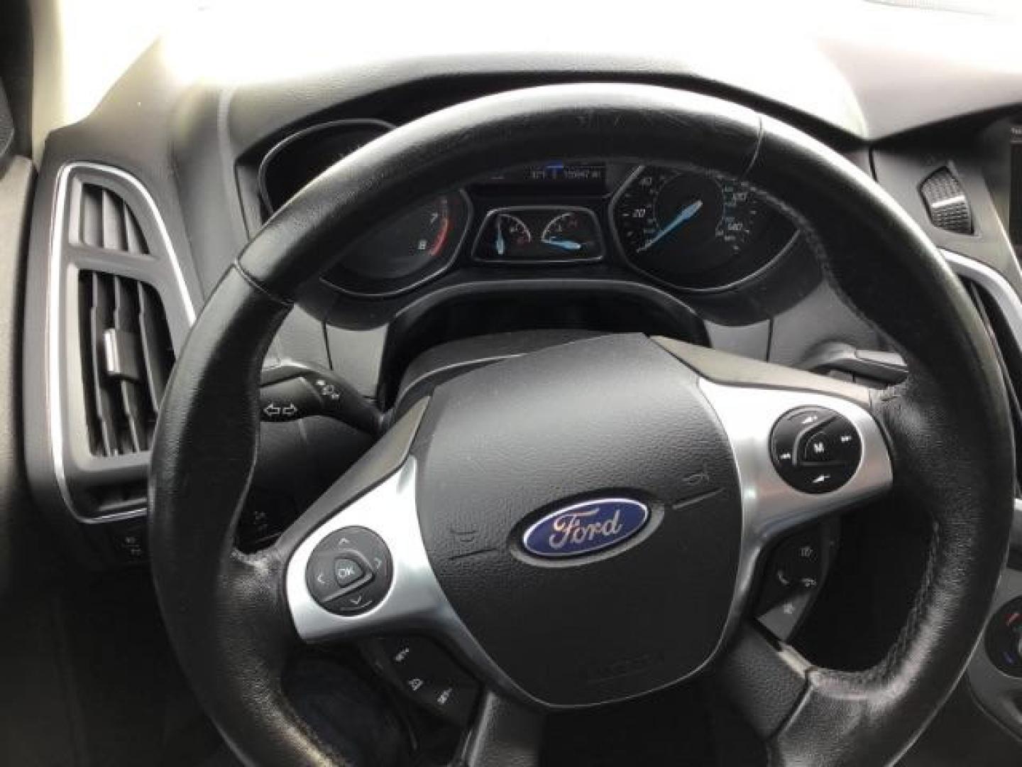 2013 Ford Focus Titanium Sedan (1FADP3J25DL) with an 2.0L L4 DOHC 16V engine, 6-Speed Automatic transmission, located at 1235 N Woodruff Ave., Idaho Falls, 83401, (208) 523-1053, 43.507172, -112.000488 - This 2013 Ford Focus Titanium , has 155,000 miles. It comes with leather interior, heated seats, push button start, back up camera, blue tooth audio, cruise control, and sunroof. At Timberline Auto it is always easy to find a great deal on your next vehicle! Our experienced sales staff can help find - Photo#14