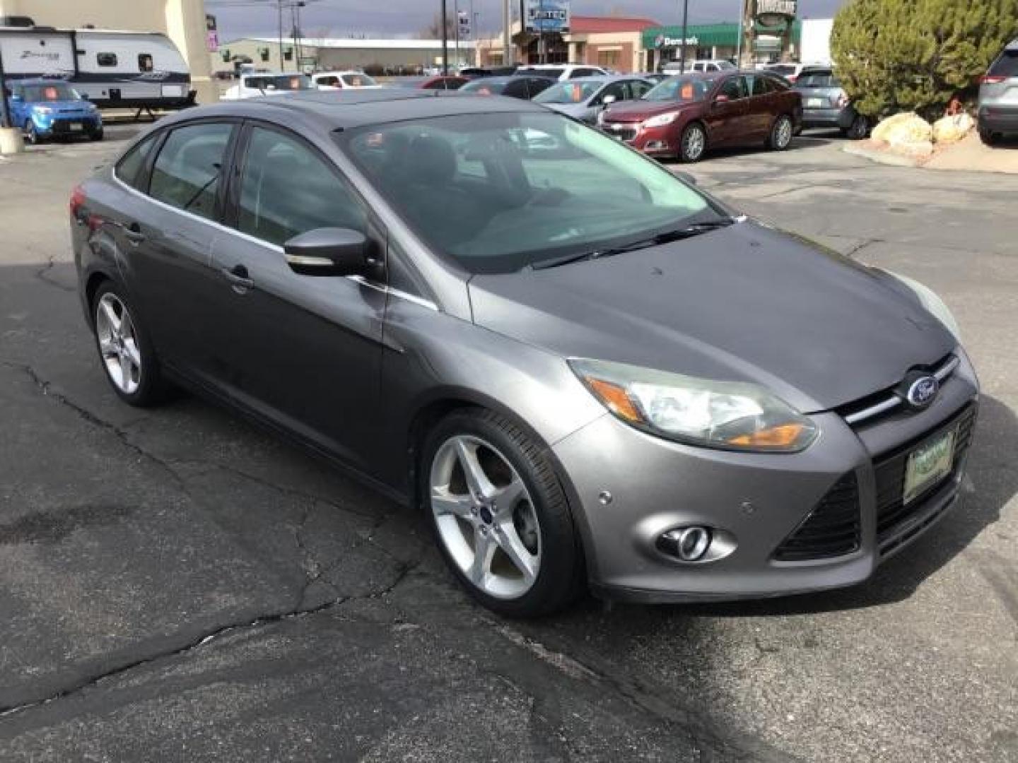 2013 Ford Focus Titanium Sedan (1FADP3J25DL) with an 2.0L L4 DOHC 16V engine, 6-Speed Automatic transmission, located at 1235 N Woodruff Ave., Idaho Falls, 83401, (208) 523-1053, 43.507172, -112.000488 - This 2013 Ford Focus Titanium , has 155,000 miles. It comes with leather interior, heated seats, push button start, back up camera, blue tooth audio, cruise control, and sunroof. At Timberline Auto it is always easy to find a great deal on your next vehicle! Our experienced sales staff can help find - Photo#6