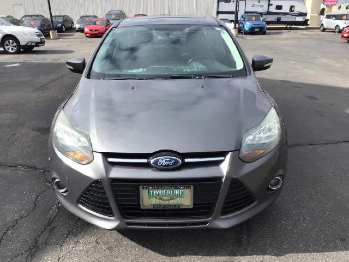 2013 Ford Focus Titanium Sedan (1FADP3J25DL) with an 2.0L L4 DOHC 16V engine, 6-Speed Automatic transmission, located at 1235 N Woodruff Ave., Idaho Falls, 83401, (208) 523-1053, 43.507172, -112.000488 - This 2013 Ford Focus Titanium , has 155,000 miles. It comes with leather interior, heated seats, push button start, back up camera, blue tooth audio, cruise control, and sunroof. At Timberline Auto it is always easy to find a great deal on your next vehicle! Our experienced sales staff can help find - Photo#7