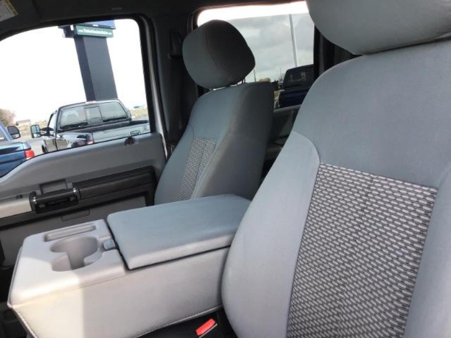 2013 Sterling Grey Metallic /Steel Cloth Interior Ford F-250 SD XLT Crew Cab 4WD (1FT7W2B66DE) with an 6.2L V8 OHV 16V engine, 6-Speed Automatic transmission, located at 1235 N Woodruff Ave., Idaho Falls, 83401, (208) 523-1053, 43.507172, -112.000488 - This 2013 Ford F250 XLT 4x4, has the 6.2L motor. It has 120,000 miles. Comes with Cloth interior, cruise control, body lift, power mirrors, keyless remote, power windows and locks, and will seat 6. At Timberline Auto it is always easy to find a great deal on your next vehicle! Our experienced sales - Photo#9