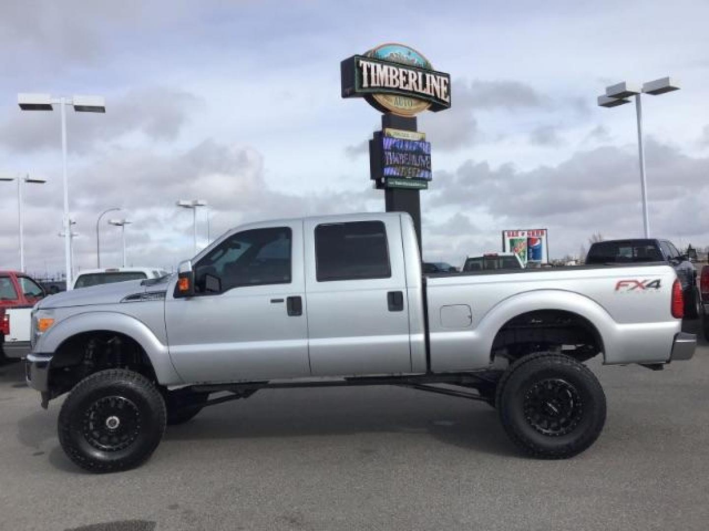 2013 Sterling Grey Metallic /Steel Cloth Interior Ford F-250 SD XLT Crew Cab 4WD (1FT7W2B66DE) with an 6.2L V8 OHV 16V engine, 6-Speed Automatic transmission, located at 1235 N Woodruff Ave., Idaho Falls, 83401, (208) 523-1053, 43.507172, -112.000488 - This 2013 Ford F250 XLT 4x4, has the 6.2L motor. It has 120,000 miles. Comes with Cloth interior, cruise control, body lift, power mirrors, keyless remote, power windows and locks, and will seat 6. At Timberline Auto it is always easy to find a great deal on your next vehicle! Our experienced sales - Photo#1