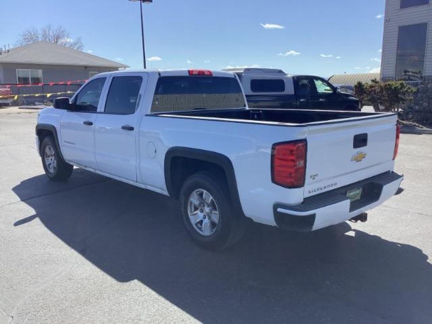 2014 Summit White /Jet Black/Dark Ash Chevrolet Silverado 1500 Work Truck 1WT Crew Cab Long Box 4WD (3GCUKPEC9EG) with an 5.3L V8 OHV 16V engine, 6-Speed Automatic transmission, located at 1235 N Woodruff Ave., Idaho Falls, 83401, (208) 523-1053, 43.507172, -112.000488 - The 2014 Chevrolet Silverado 1500 1WT (Work Truck) is a trim level designed with utility and functionality in mind. Here are some of its key features: Engine: The Silverado 1500 1WT typically comes with a 4.3-liter V6 engine, producing around 285 horsepower and 305 lb-ft of torque. Optionally, it m - Photo#2