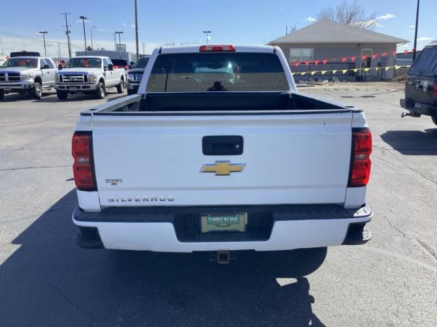 2014 Summit White /Jet Black/Dark Ash Chevrolet Silverado 1500 Work Truck 1WT Crew Cab Long Box 4WD (3GCUKPEC9EG) with an 5.3L V8 OHV 16V engine, 6-Speed Automatic transmission, located at 1235 N Woodruff Ave., Idaho Falls, 83401, (208) 523-1053, 43.507172, -112.000488 - The 2014 Chevrolet Silverado 1500 1WT (Work Truck) is a trim level designed with utility and functionality in mind. Here are some of its key features: Engine: The Silverado 1500 1WT typically comes with a 4.3-liter V6 engine, producing around 285 horsepower and 305 lb-ft of torque. Optionally, it m - Photo#3