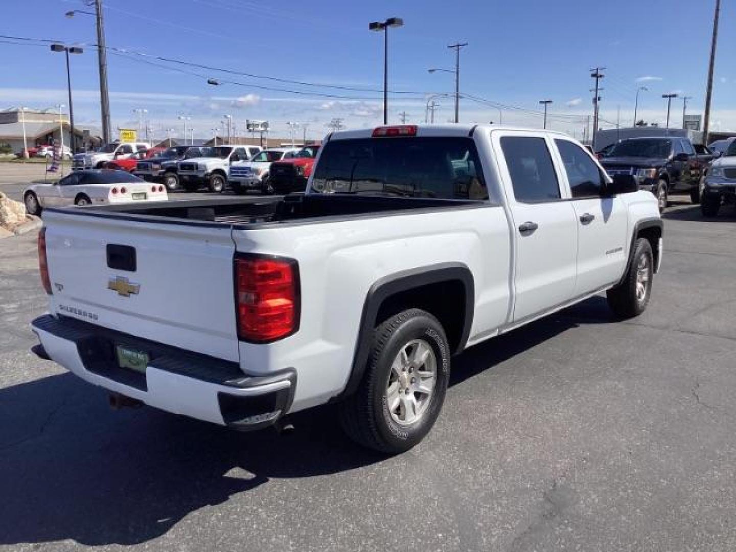 2014 Summit White /Jet Black/Dark Ash Chevrolet Silverado 1500 Work Truck 1WT Crew Cab Long Box 4WD (3GCUKPEC9EG) with an 5.3L V8 OHV 16V engine, 6-Speed Automatic transmission, located at 1235 N Woodruff Ave., Idaho Falls, 83401, (208) 523-1053, 43.507172, -112.000488 - The 2014 Chevrolet Silverado 1500 1WT (Work Truck) is a trim level designed with utility and functionality in mind. Here are some of its key features: Engine: The Silverado 1500 1WT typically comes with a 4.3-liter V6 engine, producing around 285 horsepower and 305 lb-ft of torque. Optionally, it m - Photo#4