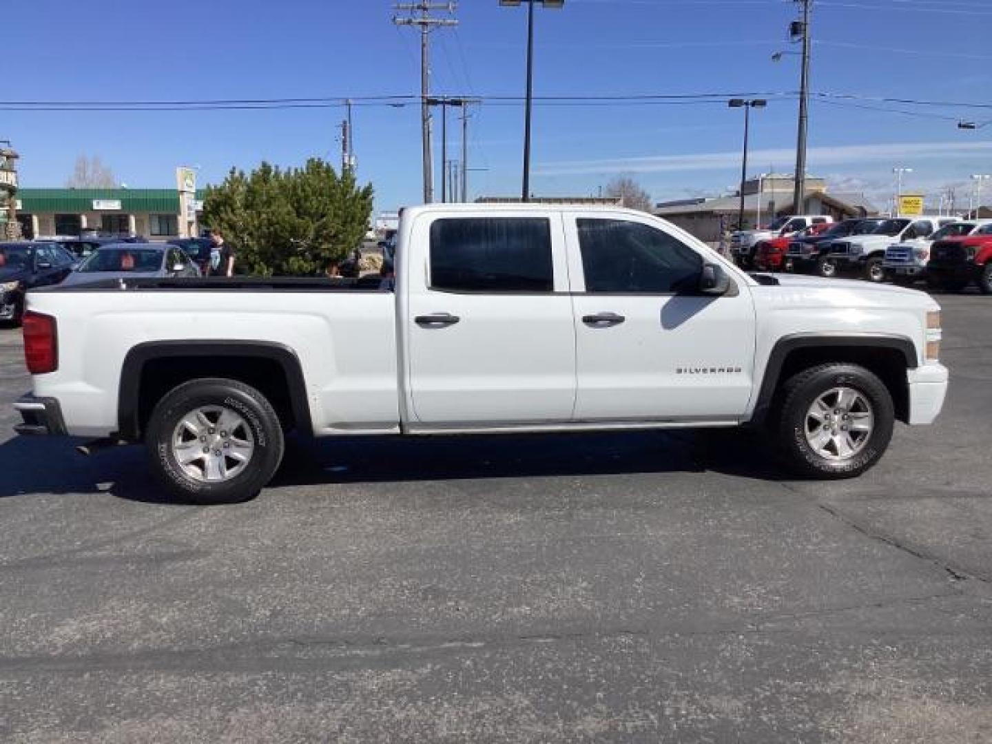 2014 Summit White /Jet Black/Dark Ash Chevrolet Silverado 1500 Work Truck 1WT Crew Cab Long Box 4WD (3GCUKPEC9EG) with an 5.3L V8 OHV 16V engine, 6-Speed Automatic transmission, located at 1235 N Woodruff Ave., Idaho Falls, 83401, (208) 523-1053, 43.507172, -112.000488 - The 2014 Chevrolet Silverado 1500 1WT (Work Truck) is a trim level designed with utility and functionality in mind. Here are some of its key features: Engine: The Silverado 1500 1WT typically comes with a 4.3-liter V6 engine, producing around 285 horsepower and 305 lb-ft of torque. Optionally, it m - Photo#5