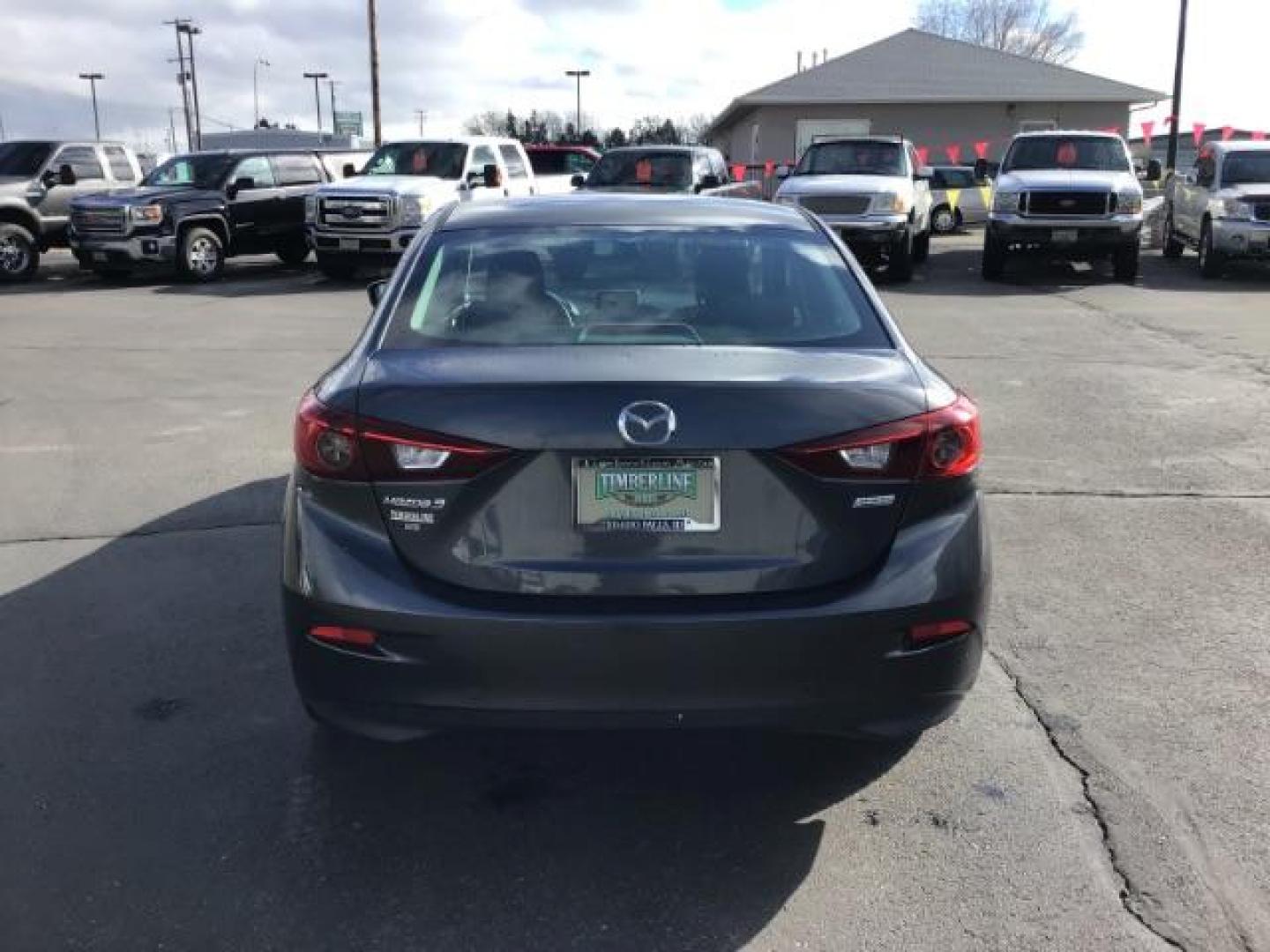 2015 Meteor Gray Mica /Black, cloth Mazda MAZDA3 i Sport AT 4-Door (3MZBM1U73FM) with an 2.0L L4 DOHC 16V engine, 6-Speed Automatic transmission, located at 1235 N Woodruff Ave., Idaho Falls, 83401, (208) 523-1053, 43.507172, -112.000488 - This 2015 Mazda 3, has 116,000 miles. It comes with cloth interior, cruise control, blue tooth audio, and power windows and locks. At Timberline Auto it is always easy to find a great deal on your next vehicle! Our experienced sales staff can help find the right vehicle will fit your needs. Our know - Photo#3