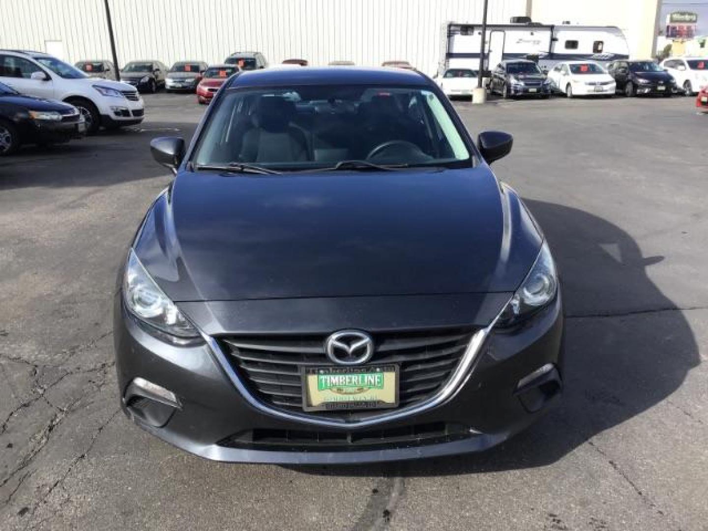 2015 Meteor Gray Mica /Black, cloth Mazda MAZDA3 i Sport AT 4-Door (3MZBM1U73FM) with an 2.0L L4 DOHC 16V engine, 6-Speed Automatic transmission, located at 1235 N Woodruff Ave., Idaho Falls, 83401, (208) 523-1053, 43.507172, -112.000488 - This 2015 Mazda 3, has 116,000 miles. It comes with cloth interior, cruise control, blue tooth audio, and power windows and locks. At Timberline Auto it is always easy to find a great deal on your next vehicle! Our experienced sales staff can help find the right vehicle will fit your needs. Our know - Photo#7