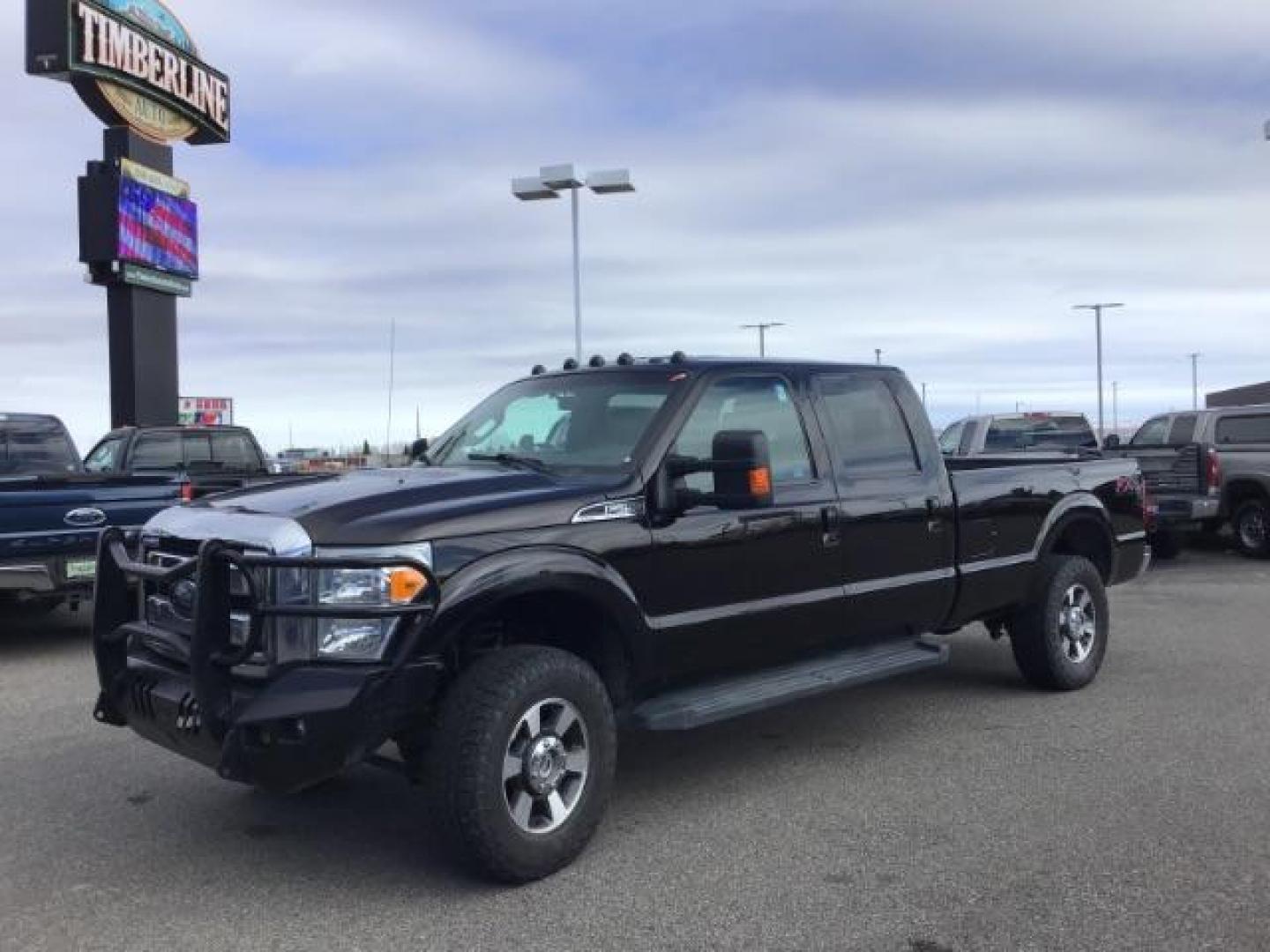 2014 BLACK /BLACK Ford F-250 SD Lariat Crew Cab Long Bed 4WD (1FT7W2BT5EE) with an 6.7L V8 OHV 16V DIESEL engine, 6-Speed Automatic transmission, located at 1235 N Woodruff Ave., Idaho Falls, 83401, (208) 523-1053, 43.507172, -112.000488 - This 2014 Ford F250 Lariat 4x4, has the 6.7 powerstroke motor. It has 98,000 miles. Comes with leather interior, heated and cooled seats, blue tooth audio, back up camera, cruise control, touch screen stereo, and turn over ball. At Timberline Auto it is always easy to find a great deal on your next - Photo#0