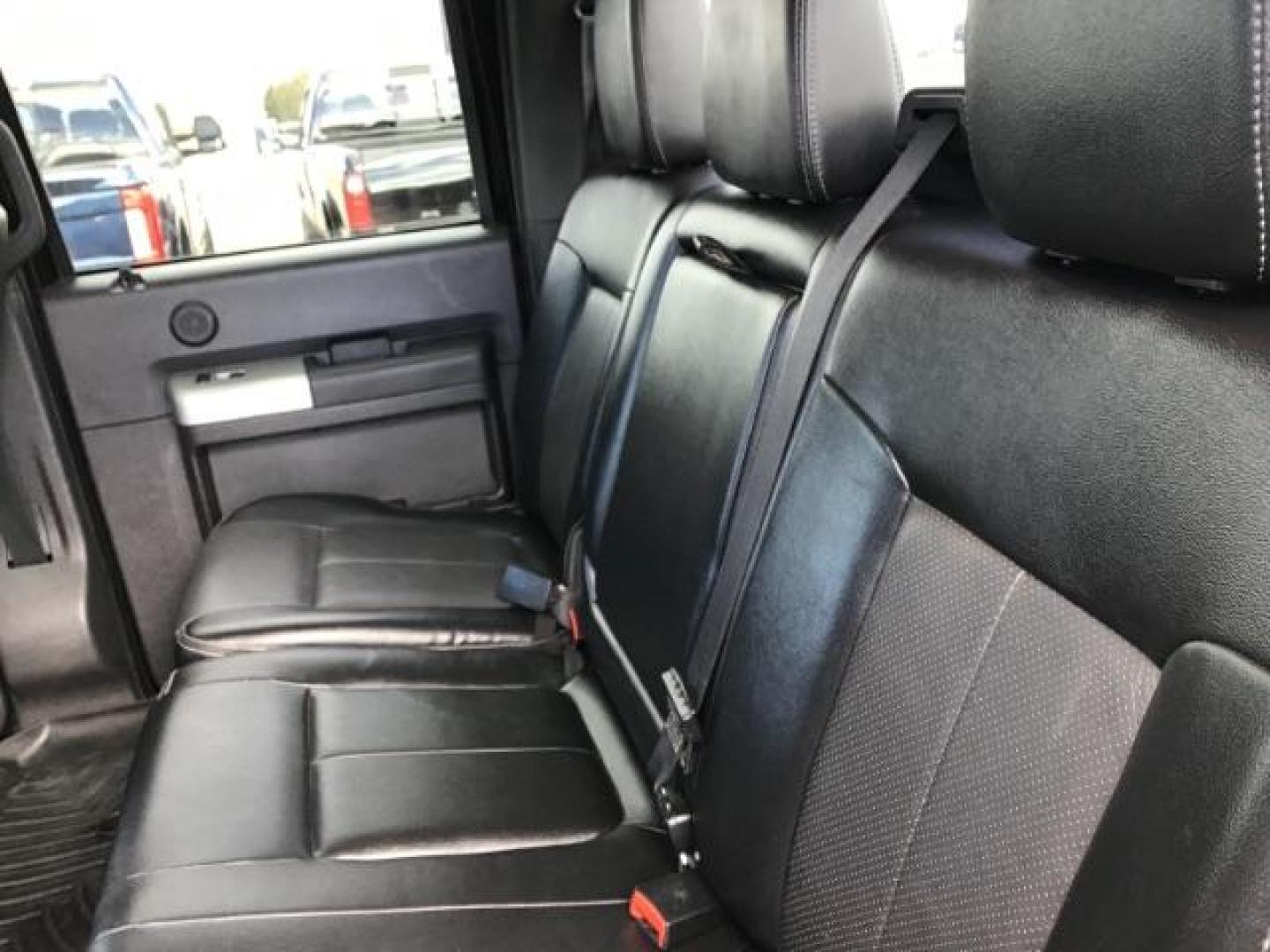 2014 BLACK /BLACK Ford F-250 SD Lariat Crew Cab Long Bed 4WD (1FT7W2BT5EE) with an 6.7L V8 OHV 16V DIESEL engine, 6-Speed Automatic transmission, located at 1235 N Woodruff Ave., Idaho Falls, 83401, (208) 523-1053, 43.507172, -112.000488 - This 2014 Ford F250 Lariat 4x4, has the 6.7 powerstroke motor. It has 98,000 miles. Comes with leather interior, heated and cooled seats, blue tooth audio, back up camera, cruise control, touch screen stereo, and turn over ball. At Timberline Auto it is always easy to find a great deal on your next - Photo#18