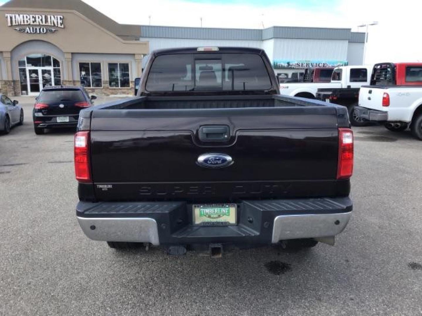 2014 BLACK /BLACK Ford F-250 SD Lariat Crew Cab Long Bed 4WD (1FT7W2BT5EE) with an 6.7L V8 OHV 16V DIESEL engine, 6-Speed Automatic transmission, located at 1235 N Woodruff Ave., Idaho Falls, 83401, (208) 523-1053, 43.507172, -112.000488 - This 2014 Ford F250 Lariat 4x4, has the 6.7 powerstroke motor. It has 98,000 miles. Comes with leather interior, heated and cooled seats, blue tooth audio, back up camera, cruise control, touch screen stereo, and turn over ball. At Timberline Auto it is always easy to find a great deal on your next - Photo#3