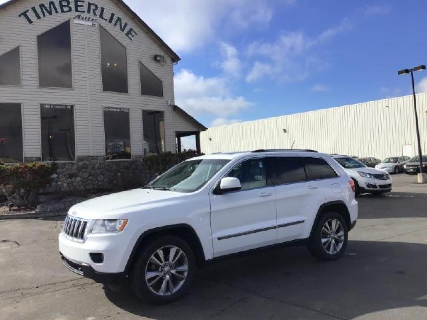 2013 Bright White /Dark Graystone/Medium Graystone Leather Interior Jeep Grand Cherokee Laredo 4WD (1C4RJFAG5DC) with an 3.6L V6 DOHC 24V engine, 5-Speed Automatic transmission, located at 1235 N Woodruff Ave., Idaho Falls, 83401, (208) 523-1053, 43.507172, -112.000488 - This 2013 Jeep Grand Cherokee Laredo 4x4, has 155,000 miles. It comes with leather seats, power seats, cruise control, touch screen stereo, sunroof, and power locks and windows. At Timberline Auto it is always easy to find a great deal on your next vehicle! Our experienced sales staff can help find - Photo#0