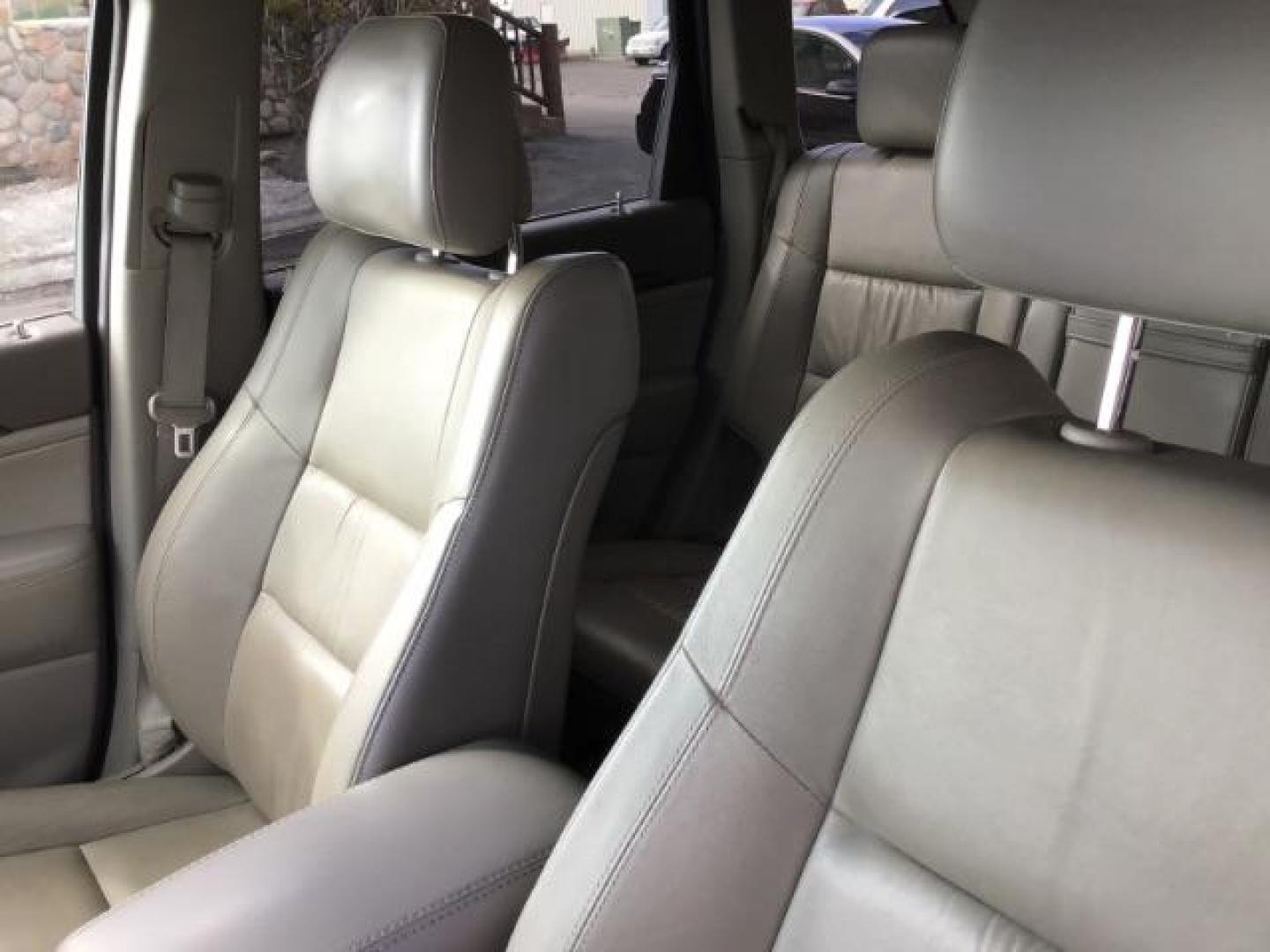 2013 Bright White /Dark Graystone/Medium Graystone Leather Interior Jeep Grand Cherokee Laredo 4WD (1C4RJFAG5DC) with an 3.6L V6 DOHC 24V engine, 5-Speed Automatic transmission, located at 1235 N Woodruff Ave., Idaho Falls, 83401, (208) 523-1053, 43.507172, -112.000488 - This 2013 Jeep Grand Cherokee Laredo 4x4, has 155,000 miles. It comes with leather seats, power seats, cruise control, touch screen stereo, sunroof, and power locks and windows. At Timberline Auto it is always easy to find a great deal on your next vehicle! Our experienced sales staff can help find - Photo#9