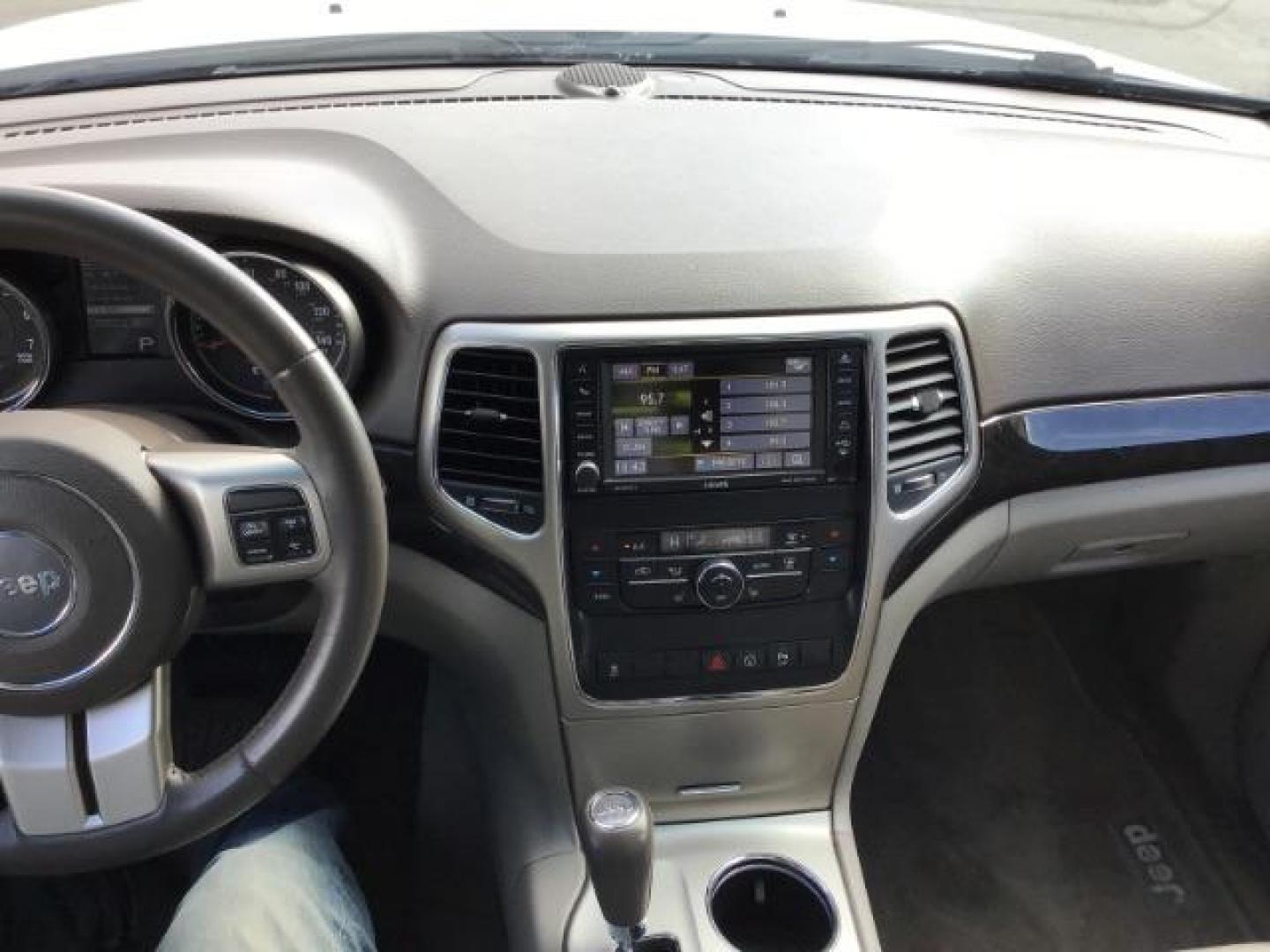 2013 Bright White /Dark Graystone/Medium Graystone Leather Interior Jeep Grand Cherokee Laredo 4WD (1C4RJFAG5DC) with an 3.6L V6 DOHC 24V engine, 5-Speed Automatic transmission, located at 1235 N Woodruff Ave., Idaho Falls, 83401, (208) 523-1053, 43.507172, -112.000488 - This 2013 Jeep Grand Cherokee Laredo 4x4, has 155,000 miles. It comes with leather seats, power seats, cruise control, touch screen stereo, sunroof, and power locks and windows. At Timberline Auto it is always easy to find a great deal on your next vehicle! Our experienced sales staff can help find - Photo#10