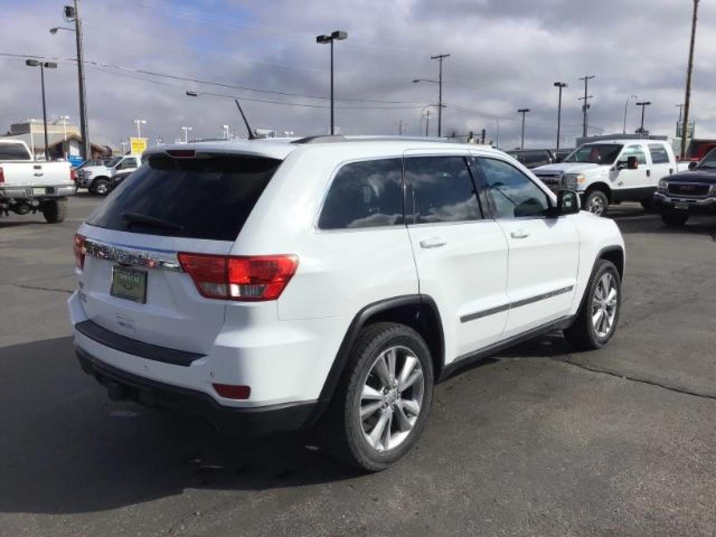 2013 Bright White /Dark Graystone/Medium Graystone Leather Interior Jeep Grand Cherokee Laredo 4WD (1C4RJFAG5DC) with an 3.6L V6 DOHC 24V engine, 5-Speed Automatic transmission, located at 1235 N Woodruff Ave., Idaho Falls, 83401, (208) 523-1053, 43.507172, -112.000488 - This 2013 Jeep Grand Cherokee Laredo 4x4, has 155,000 miles. It comes with leather seats, power seats, cruise control, touch screen stereo, sunroof, and power locks and windows. At Timberline Auto it is always easy to find a great deal on your next vehicle! Our experienced sales staff can help find - Photo#4