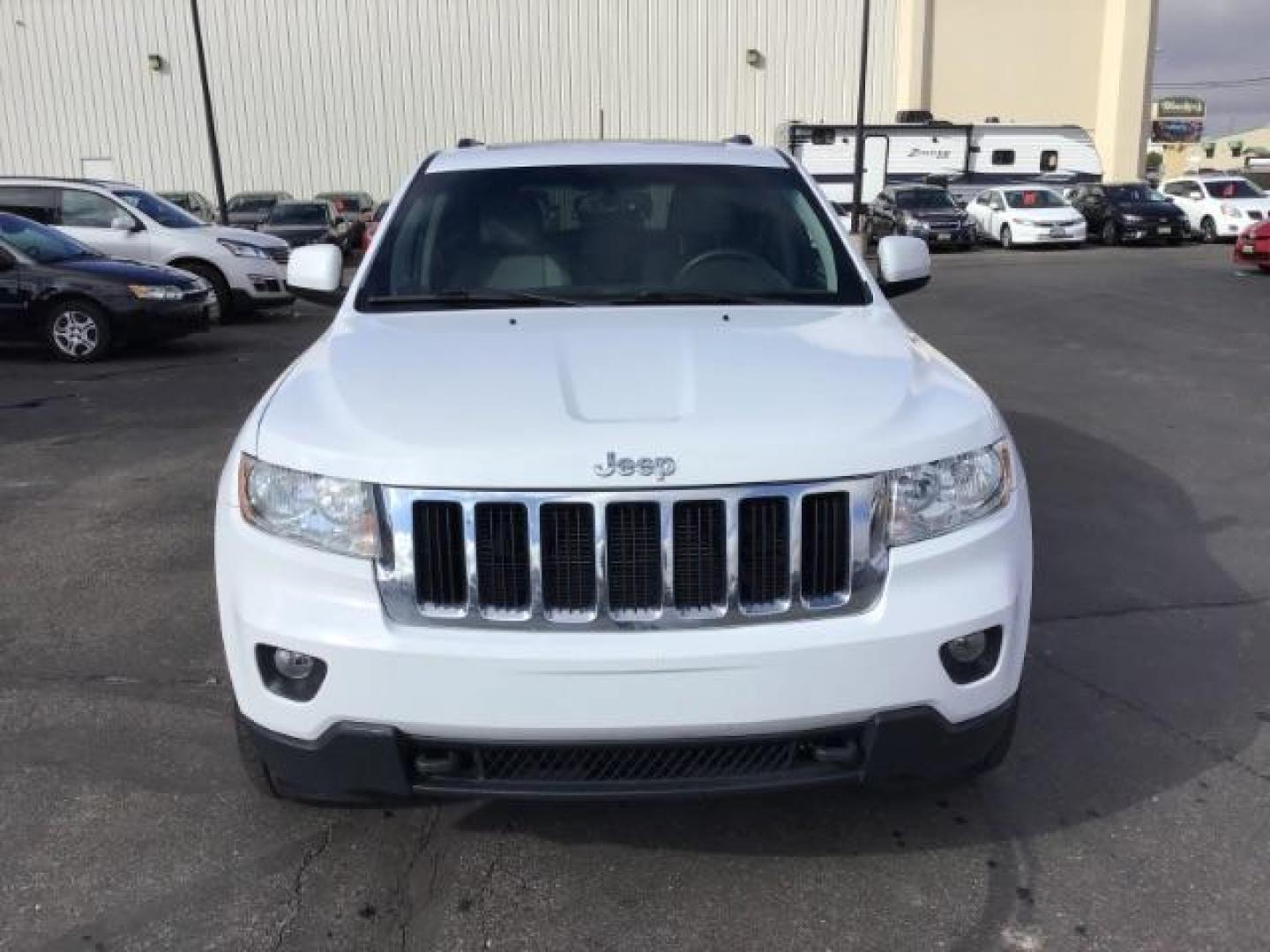 2013 Bright White /Dark Graystone/Medium Graystone Leather Interior Jeep Grand Cherokee Laredo 4WD (1C4RJFAG5DC) with an 3.6L V6 DOHC 24V engine, 5-Speed Automatic transmission, located at 1235 N Woodruff Ave., Idaho Falls, 83401, (208) 523-1053, 43.507172, -112.000488 - This 2013 Jeep Grand Cherokee Laredo 4x4, has 155,000 miles. It comes with leather seats, power seats, cruise control, touch screen stereo, sunroof, and power locks and windows. At Timberline Auto it is always easy to find a great deal on your next vehicle! Our experienced sales staff can help find - Photo#7