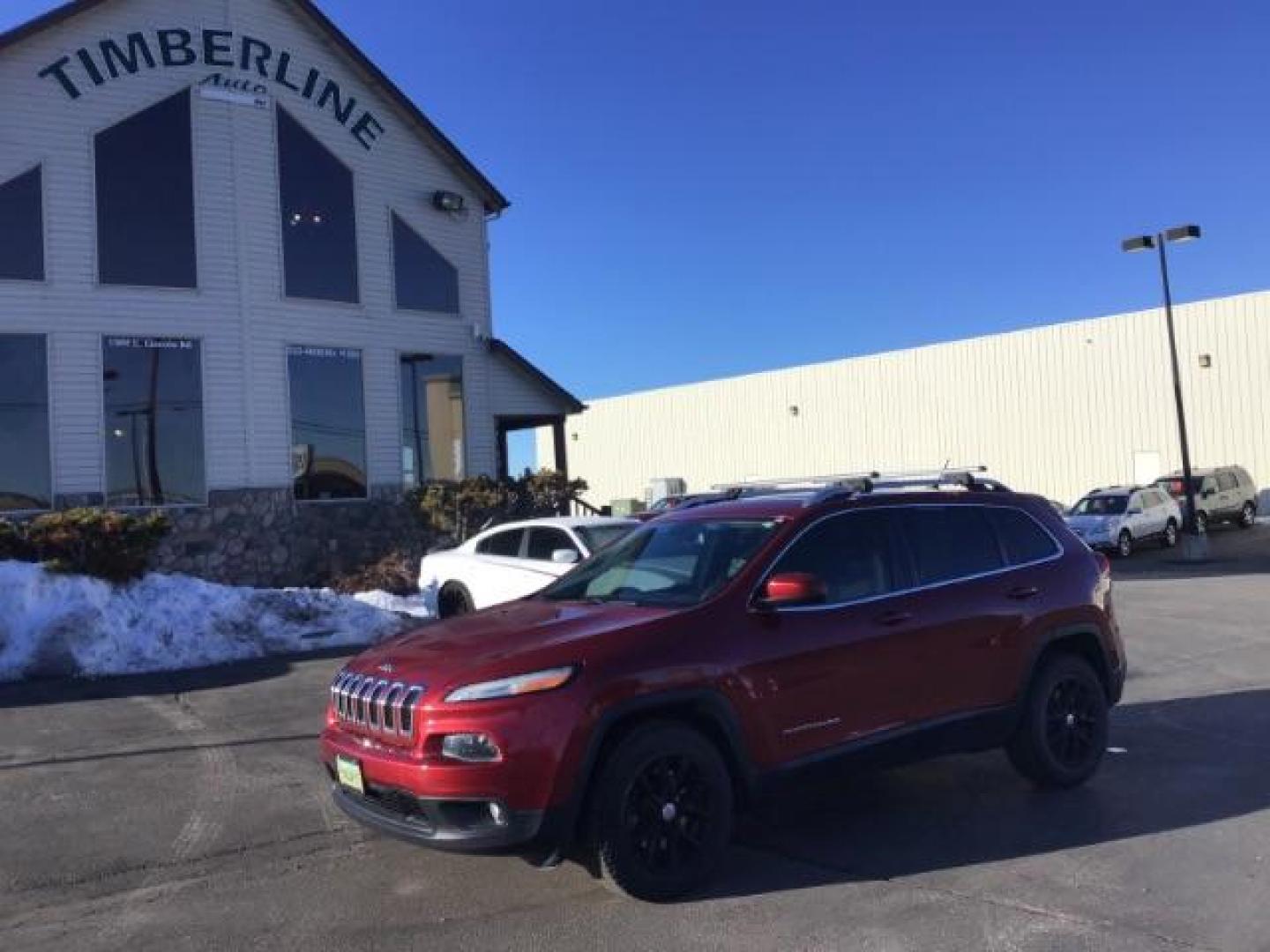 2014 Dp Cherry Red Crystal PC /Black/Iceland Gray Jeep Cherokee Latitude 4WD (1C4PJMCS3EW) with an 3.2L V6 DOHC 24V engine, 9-Speed Automatic transmission, located at 1235 N Woodruff Ave., Idaho Falls, 83401, (208) 523-1053, 43.507172, -112.000488 - This 2014 Jeep Cherokee Latitude 4x4, has the 3.2L V6 motor. It has 79,000 miles. It comes with cloth seats, cruise control, power windows and locks ,and blue tooth audio At Timberline Auto it is always easy to find a great deal on your next vehicle! Our experienced sales staff can help find the ri - Photo#0