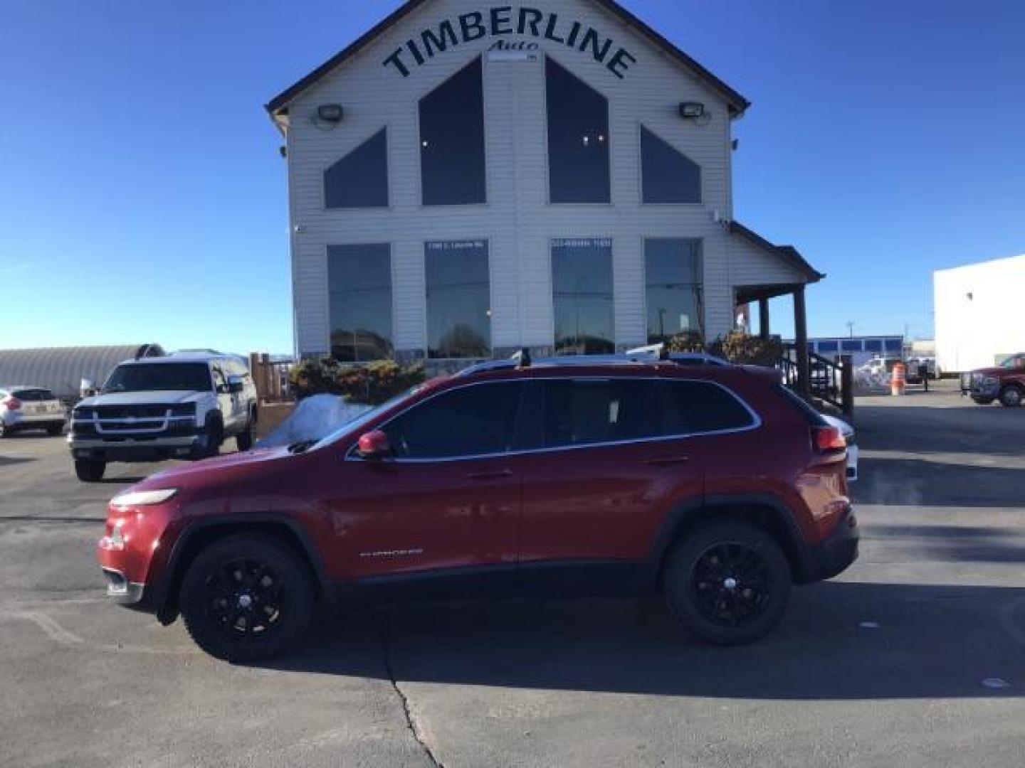 2014 Dp Cherry Red Crystal PC /Black/Iceland Gray Jeep Cherokee Latitude 4WD (1C4PJMCS3EW) with an 3.2L V6 DOHC 24V engine, 9-Speed Automatic transmission, located at 1235 N Woodruff Ave., Idaho Falls, 83401, (208) 523-1053, 43.507172, -112.000488 - This 2014 Jeep Cherokee Latitude 4x4, has the 3.2L V6 motor. It has 79,000 miles. It comes with cloth seats, cruise control, power windows and locks ,and blue tooth audio At Timberline Auto it is always easy to find a great deal on your next vehicle! Our experienced sales staff can help find the ri - Photo#1