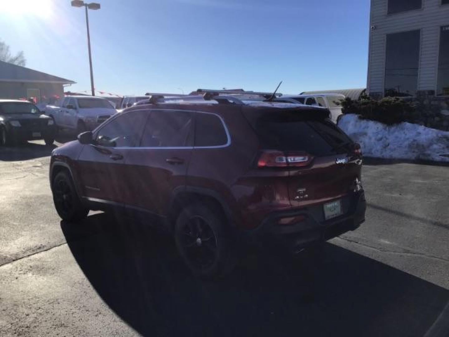 2014 Dp Cherry Red Crystal PC /Black/Iceland Gray Jeep Cherokee Latitude 4WD (1C4PJMCS3EW) with an 3.2L V6 DOHC 24V engine, 9-Speed Automatic transmission, located at 1235 N Woodruff Ave., Idaho Falls, 83401, (208) 523-1053, 43.507172, -112.000488 - This 2014 Jeep Cherokee Latitude 4x4, has the 3.2L V6 motor. It has 79,000 miles. It comes with cloth seats, cruise control, power windows and locks ,and blue tooth audio At Timberline Auto it is always easy to find a great deal on your next vehicle! Our experienced sales staff can help find the ri - Photo#2