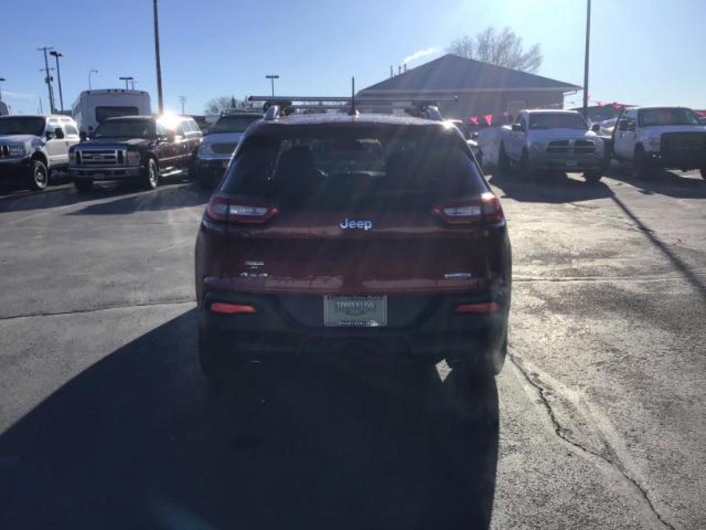 2014 Dp Cherry Red Crystal PC /Black/Iceland Gray Jeep Cherokee Latitude 4WD (1C4PJMCS3EW) with an 3.2L V6 DOHC 24V engine, 9-Speed Automatic transmission, located at 1235 N Woodruff Ave., Idaho Falls, 83401, (208) 523-1053, 43.507172, -112.000488 - This 2014 Jeep Cherokee Latitude 4x4, has the 3.2L V6 motor. It has 79,000 miles. It comes with cloth seats, cruise control, power windows and locks ,and blue tooth audio At Timberline Auto it is always easy to find a great deal on your next vehicle! Our experienced sales staff can help find the ri - Photo#3