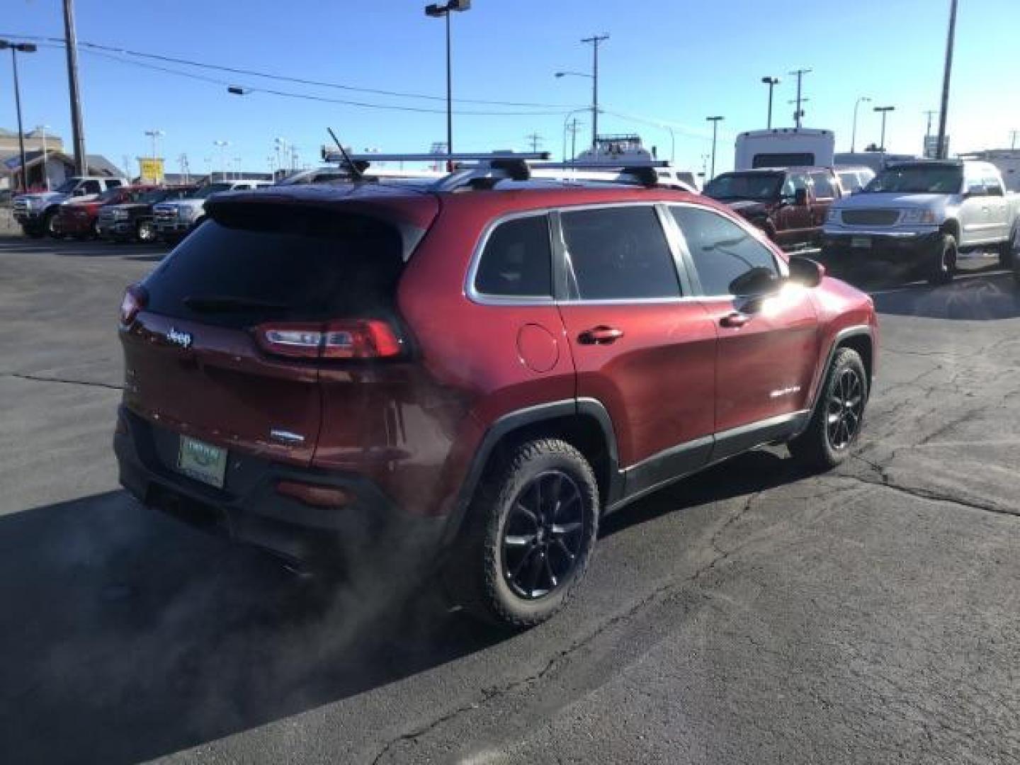 2014 Dp Cherry Red Crystal PC /Black/Iceland Gray Jeep Cherokee Latitude 4WD (1C4PJMCS3EW) with an 3.2L V6 DOHC 24V engine, 9-Speed Automatic transmission, located at 1235 N Woodruff Ave., Idaho Falls, 83401, (208) 523-1053, 43.507172, -112.000488 - This 2014 Jeep Cherokee Latitude 4x4, has the 3.2L V6 motor. It has 79,000 miles. It comes with cloth seats, cruise control, power windows and locks ,and blue tooth audio At Timberline Auto it is always easy to find a great deal on your next vehicle! Our experienced sales staff can help find the ri - Photo#4