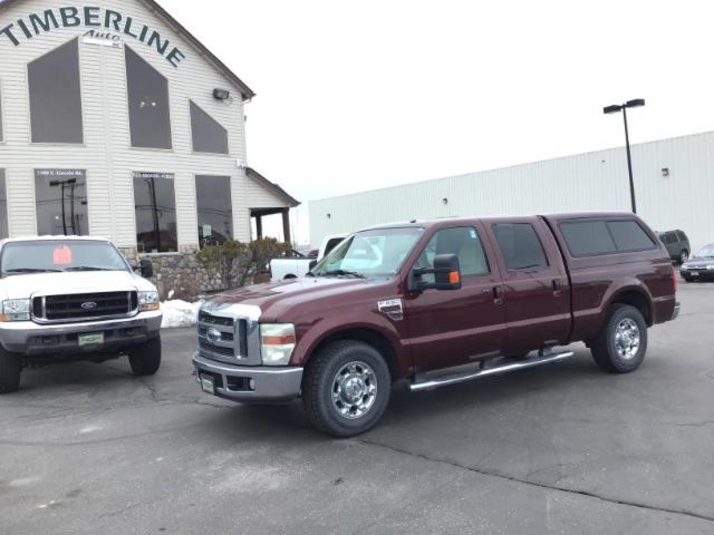 2010 MAROON /Camel Leather Interior Ford F-250 SD Lariat Crew Cab 2WD (1FTSW2AR7AE) with an 6.4L V8 OHV 32V TURBO DIESEL engine, 5-Speed Automatic Overdrive transmission, located at 1235 N Woodruff Ave., Idaho Falls, 83401, (208) 523-1053, 43.507172, -112.000488 - Photo#0