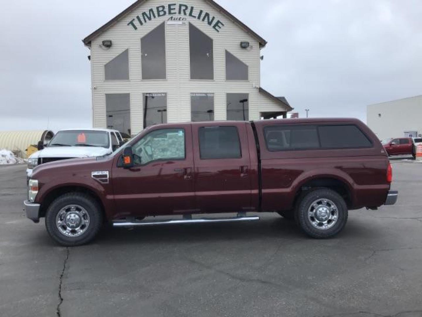 2010 MAROON /Camel Leather Interior Ford F-250 SD Lariat Crew Cab 2WD (1FTSW2AR7AE) with an 6.4L V8 OHV 32V TURBO DIESEL engine, 5-Speed Automatic Overdrive transmission, located at 1235 N Woodruff Ave., Idaho Falls, 83401, (208) 523-1053, 43.507172, -112.000488 - Photo#1