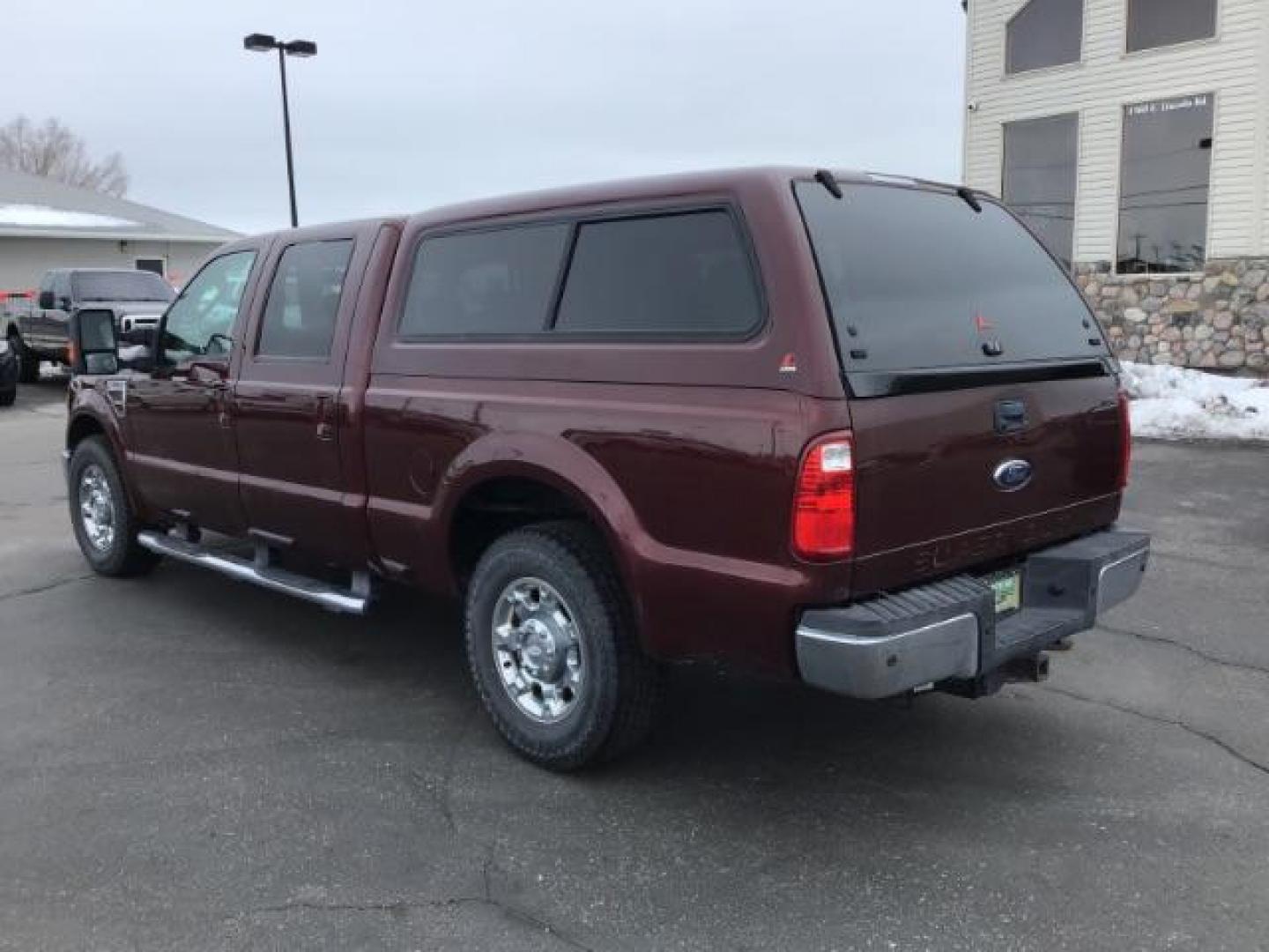 2010 MAROON /Camel Leather Interior Ford F-250 SD Lariat Crew Cab 2WD (1FTSW2AR7AE) with an 6.4L V8 OHV 32V TURBO DIESEL engine, 5-Speed Automatic Overdrive transmission, located at 1235 N Woodruff Ave., Idaho Falls, 83401, (208) 523-1053, 43.507172, -112.000488 - Photo#2