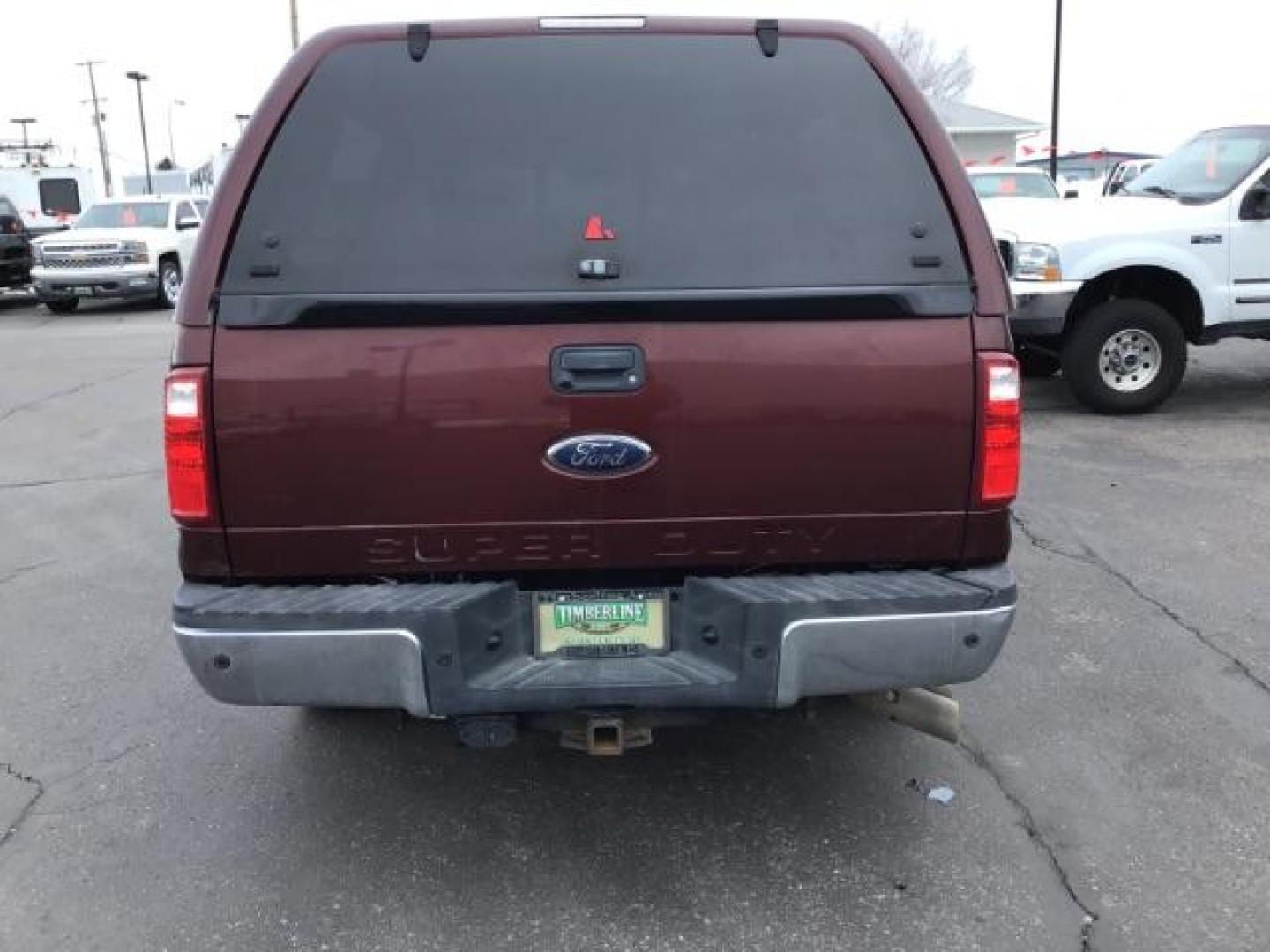 2010 MAROON /Camel Leather Interior Ford F-250 SD Lariat Crew Cab 2WD (1FTSW2AR7AE) with an 6.4L V8 OHV 32V TURBO DIESEL engine, 5-Speed Automatic Overdrive transmission, located at 1235 N Woodruff Ave., Idaho Falls, 83401, (208) 523-1053, 43.507172, -112.000488 - Photo#3