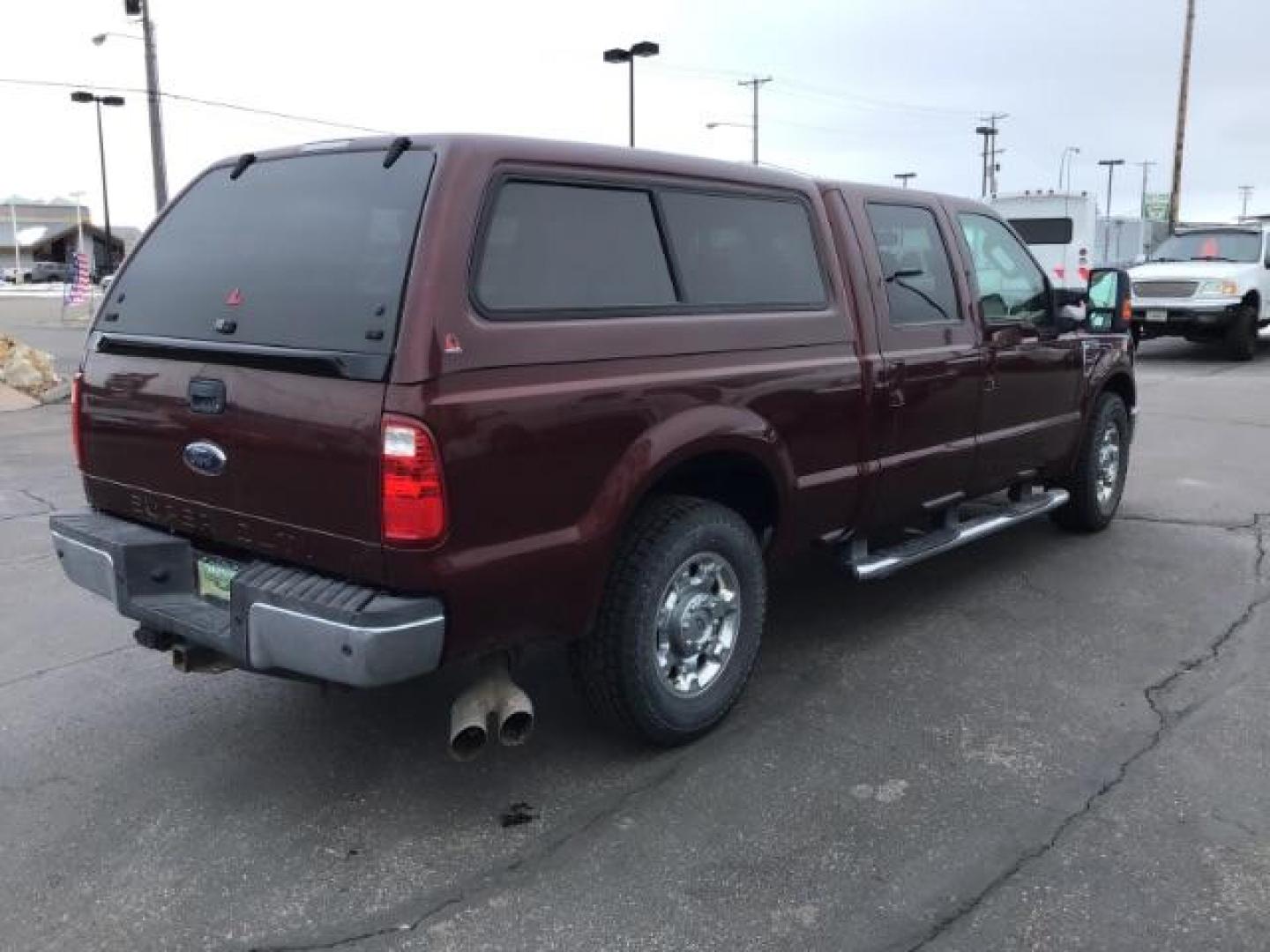 2010 MAROON /Camel Leather Interior Ford F-250 SD Lariat Crew Cab 2WD (1FTSW2AR7AE) with an 6.4L V8 OHV 32V TURBO DIESEL engine, 5-Speed Automatic Overdrive transmission, located at 1235 N Woodruff Ave., Idaho Falls, 83401, (208) 523-1053, 43.507172, -112.000488 - Photo#4