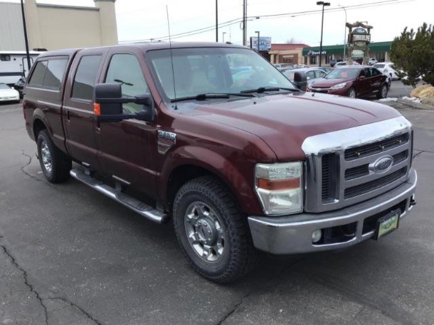 2010 MAROON /Camel Leather Interior Ford F-250 SD Lariat Crew Cab 2WD (1FTSW2AR7AE) with an 6.4L V8 OHV 32V TURBO DIESEL engine, 5-Speed Automatic Overdrive transmission, located at 1235 N Woodruff Ave., Idaho Falls, 83401, (208) 523-1053, 43.507172, -112.000488 - Photo#5