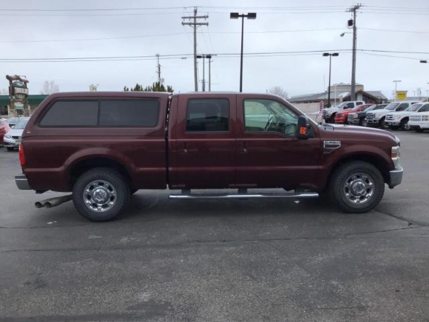 2010 MAROON /Camel Leather Interior Ford F-250 SD Lariat Crew Cab 2WD (1FTSW2AR7AE) with an 6.4L V8 OHV 32V TURBO DIESEL engine, 5-Speed Automatic Overdrive transmission, located at 1235 N Woodruff Ave., Idaho Falls, 83401, (208) 523-1053, 43.507172, -112.000488 - Photo#6