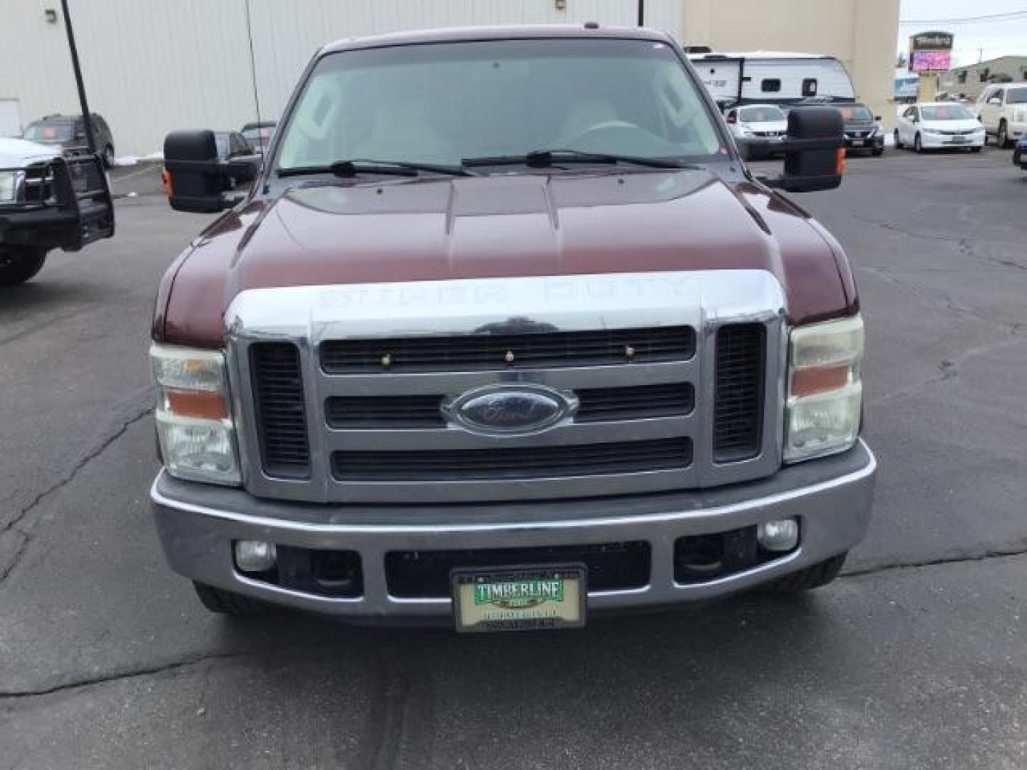 2010 MAROON /Camel Leather Interior Ford F-250 SD Lariat Crew Cab 2WD (1FTSW2AR7AE) with an 6.4L V8 OHV 32V TURBO DIESEL engine, 5-Speed Automatic Overdrive transmission, located at 1235 N Woodruff Ave., Idaho Falls, 83401, (208) 523-1053, 43.507172, -112.000488 - Photo#7