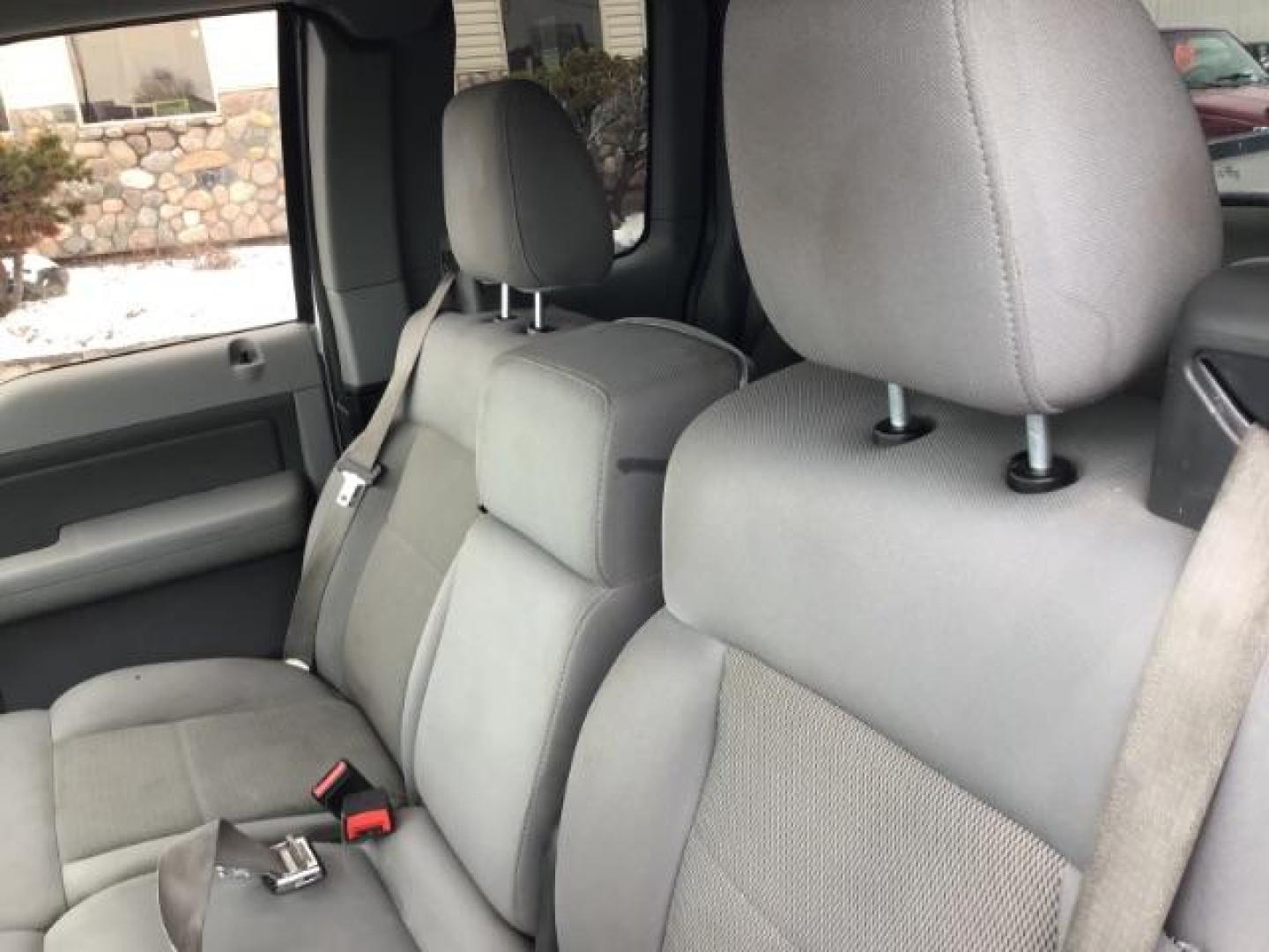 2006 WHITE /Med/Dark Flint Cloth Interior Ford F-150 XLT SuperCab 5.5-ft Box 4WD (1FTPX14V66N) with an 5.4L V8 SOHC 24V FFV engine, 4-Speed Automatic transmission, located at 1235 N Woodruff Ave., Idaho Falls, 83401, (208) 523-1053, 43.507172, -112.000488 - This 2006 Ford F150 XLT 4x4, has the 5.4L V8 motor. It has 150,000 miles. Comes with cloth seats, cruise control, AM/FM CD stereo, and power windows and locks. At Timberline Auto it is always easy to find a great deal on your next vehicle! Our experienced sales staff can help find the right vehicle - Photo#9