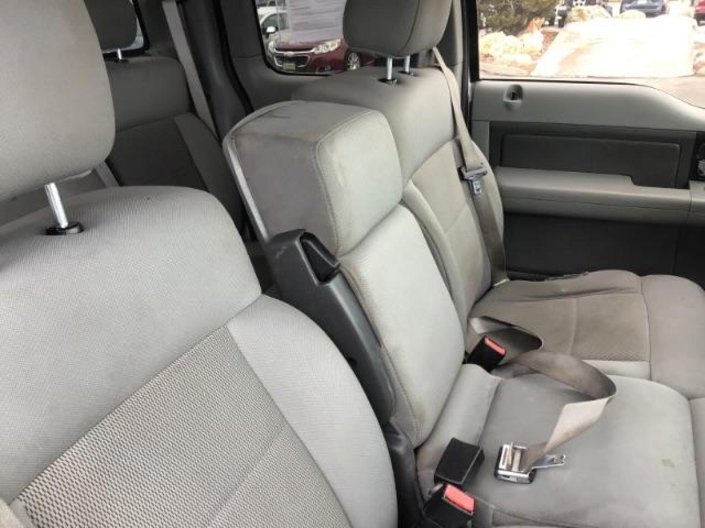 2006 WHITE /Med/Dark Flint Cloth Interior Ford F-150 XLT SuperCab 5.5-ft Box 4WD (1FTPX14V66N) with an 5.4L V8 SOHC 24V FFV engine, 4-Speed Automatic transmission, located at 1235 N Woodruff Ave., Idaho Falls, 83401, (208) 523-1053, 43.507172, -112.000488 - This 2006 Ford F150 XLT 4x4, has the 5.4L V8 motor. It has 150,000 miles. Comes with cloth seats, cruise control, AM/FM CD stereo, and power windows and locks. At Timberline Auto it is always easy to find a great deal on your next vehicle! Our experienced sales staff can help find the right vehicle - Photo#22