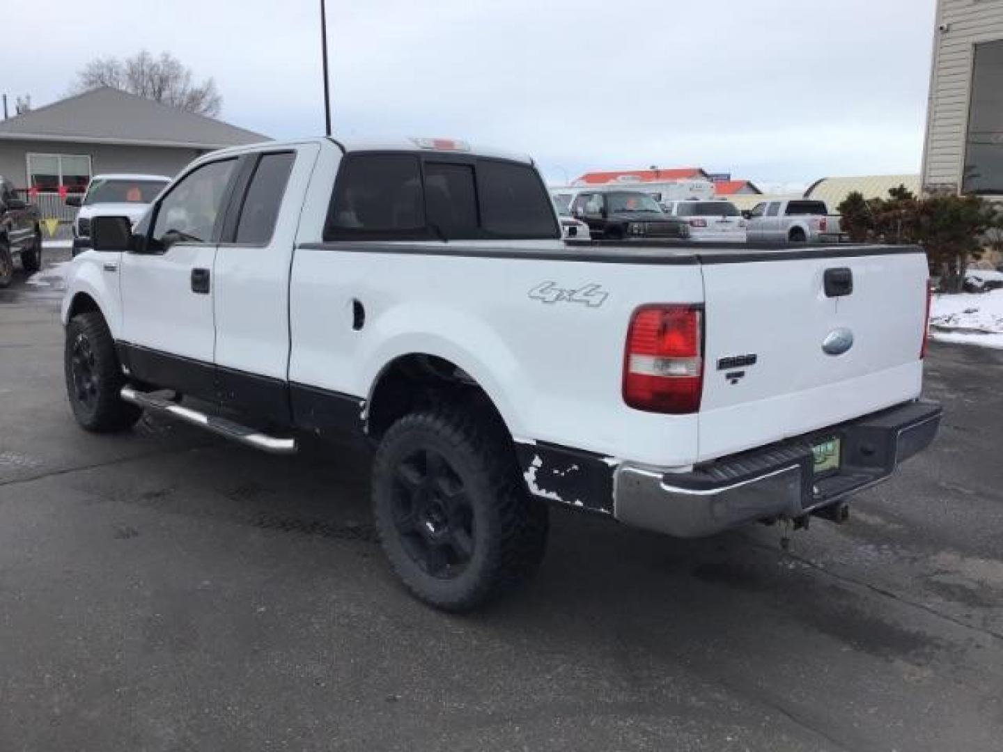 2006 WHITE /Med/Dark Flint Cloth Interior Ford F-150 XLT SuperCab 5.5-ft Box 4WD (1FTPX14V66N) with an 5.4L V8 SOHC 24V FFV engine, 4-Speed Automatic transmission, located at 1235 N Woodruff Ave., Idaho Falls, 83401, (208) 523-1053, 43.507172, -112.000488 - This 2006 Ford F150 XLT 4x4, has the 5.4L V8 motor. It has 150,000 miles. Comes with cloth seats, cruise control, AM/FM CD stereo, and power windows and locks. At Timberline Auto it is always easy to find a great deal on your next vehicle! Our experienced sales staff can help find the right vehicle - Photo#2