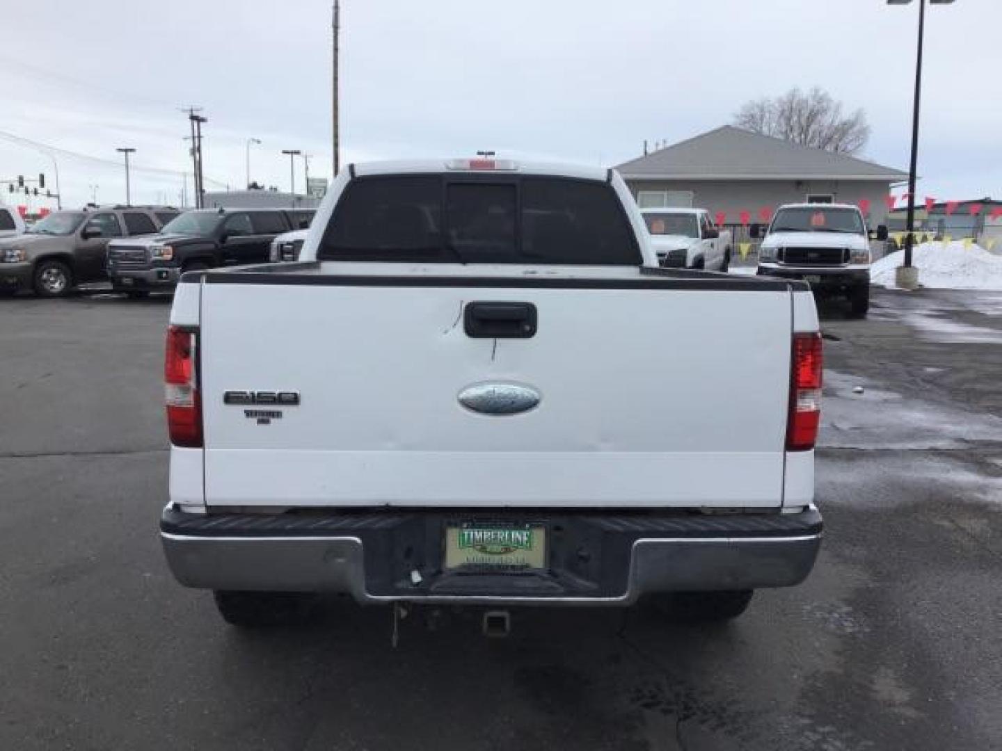 2006 WHITE /Med/Dark Flint Cloth Interior Ford F-150 XLT SuperCab 5.5-ft Box 4WD (1FTPX14V66N) with an 5.4L V8 SOHC 24V FFV engine, 4-Speed Automatic transmission, located at 1235 N Woodruff Ave., Idaho Falls, 83401, (208) 523-1053, 43.507172, -112.000488 - This 2006 Ford F150 XLT 4x4, has the 5.4L V8 motor. It has 150,000 miles. Comes with cloth seats, cruise control, AM/FM CD stereo, and power windows and locks. At Timberline Auto it is always easy to find a great deal on your next vehicle! Our experienced sales staff can help find the right vehicle - Photo#3