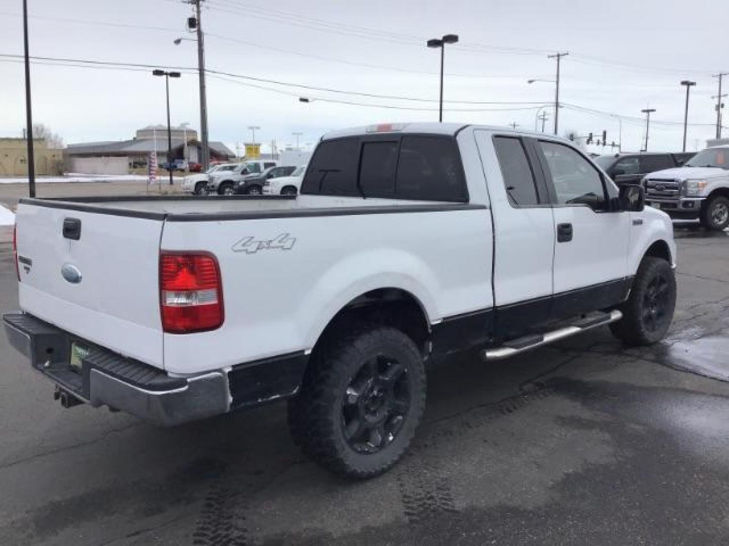 2006 WHITE /Med/Dark Flint Cloth Interior Ford F-150 XLT SuperCab 5.5-ft Box 4WD (1FTPX14V66N) with an 5.4L V8 SOHC 24V FFV engine, 4-Speed Automatic transmission, located at 1235 N Woodruff Ave., Idaho Falls, 83401, (208) 523-1053, 43.507172, -112.000488 - This 2006 Ford F150 XLT 4x4, has the 5.4L V8 motor. It has 150,000 miles. Comes with cloth seats, cruise control, AM/FM CD stereo, and power windows and locks. At Timberline Auto it is always easy to find a great deal on your next vehicle! Our experienced sales staff can help find the right vehicle - Photo#4