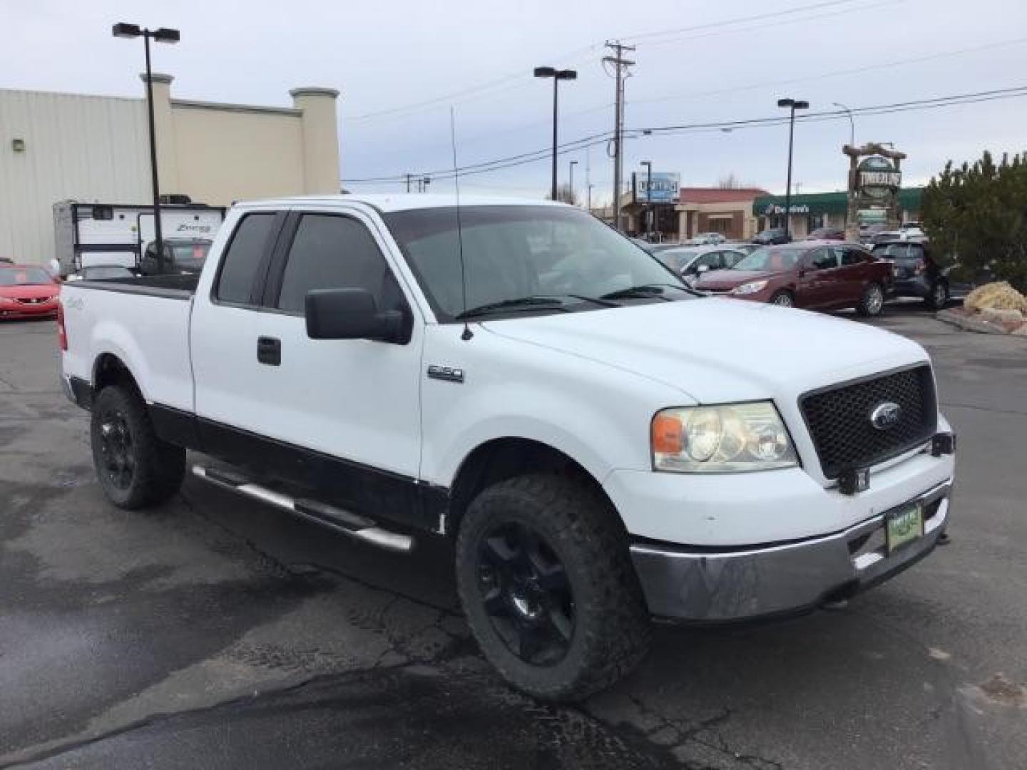 2006 WHITE /Med/Dark Flint Cloth Interior Ford F-150 XLT SuperCab 5.5-ft Box 4WD (1FTPX14V66N) with an 5.4L V8 SOHC 24V FFV engine, 4-Speed Automatic transmission, located at 1235 N Woodruff Ave., Idaho Falls, 83401, (208) 523-1053, 43.507172, -112.000488 - This 2006 Ford F150 XLT 4x4, has the 5.4L V8 motor. It has 150,000 miles. Comes with cloth seats, cruise control, AM/FM CD stereo, and power windows and locks. At Timberline Auto it is always easy to find a great deal on your next vehicle! Our experienced sales staff can help find the right vehicle - Photo#6