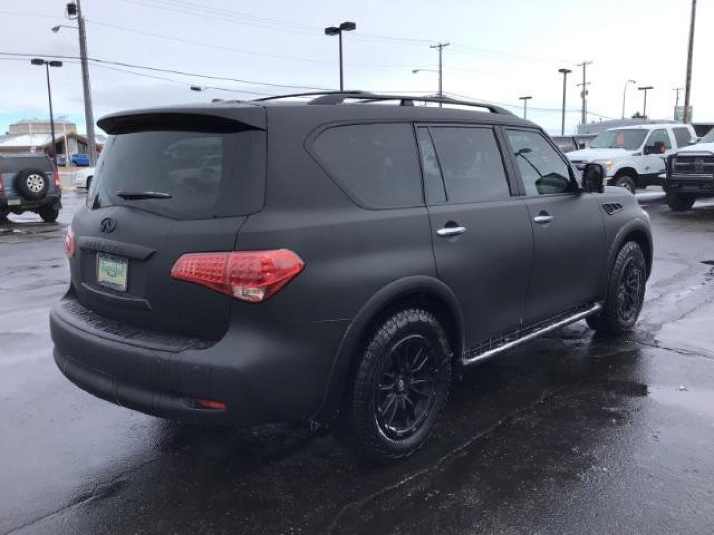 2011 Black Obsidian /Wheat Leather Interior Infiniti QX56 LEATHER (JN8AZ2NF7B9) with an 5.6L V8 DOHC 32V engine, 5-Speed Automatic transmission, located at 1235 N Woodruff Ave., Idaho Falls, 83401, (208) 523-1053, 43.507172, -112.000488 - This 2011 Infiniti QX56, has 122,000 miles. Comes with leather interior, heated front and rear seats, back up camera, navigation, sunroof, cruise control, and power seats. At Timberline Auto it is always easy to find a great deal on your next vehicle! Our experienced sales staff can help find the ri - Photo#4