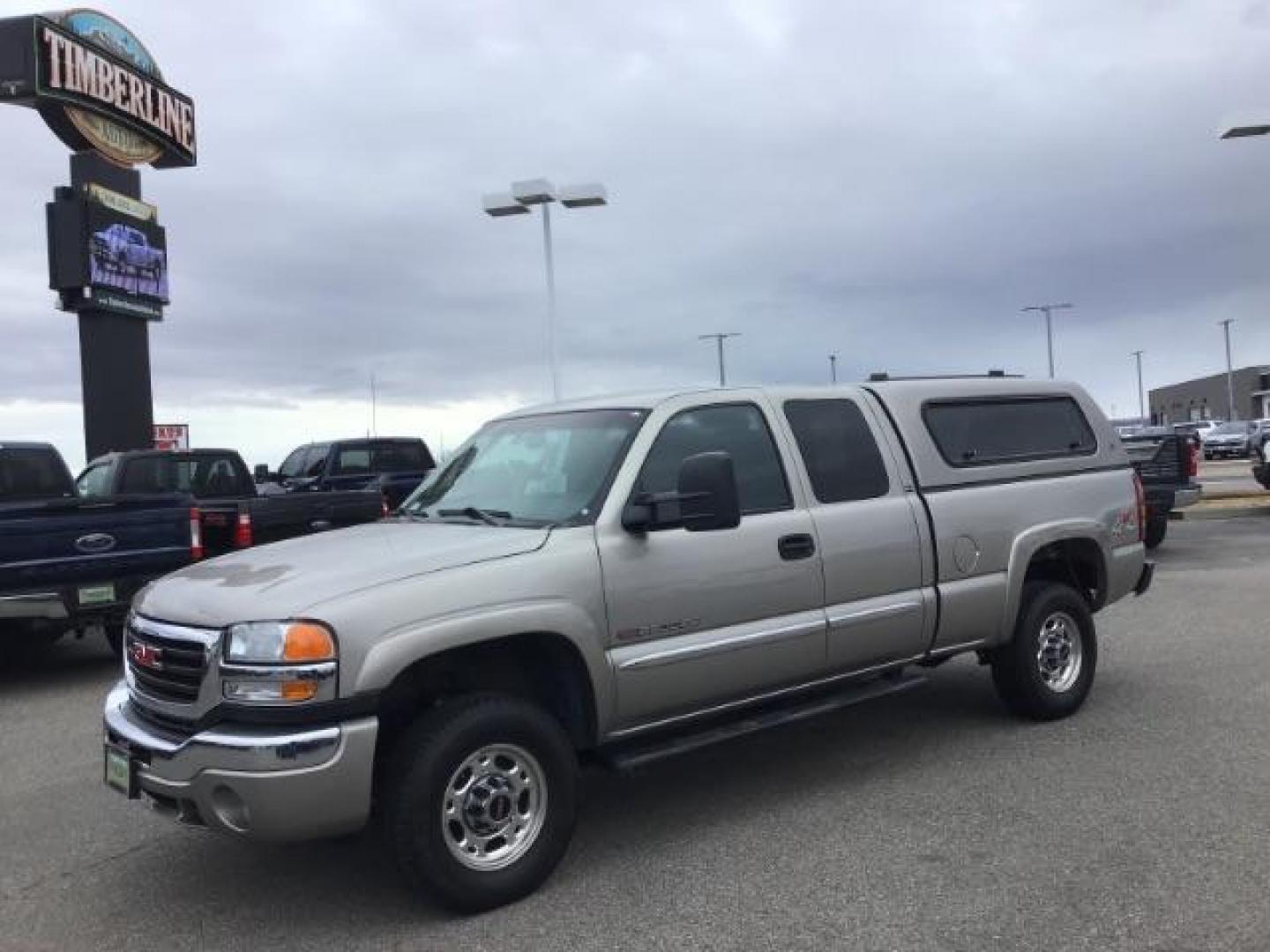 2003 Pewter Metallic /Dark Pewter Custom Cloth Interior GMC Sierra 2500HD SLE Ext. Cab Short Bed 4WD (1GTHK29G93E) with an 8.1L V8 OHV 16V engine, 4-Speed Automatic transmission, located at 1235 N Woodruff Ave., Idaho Falls, 83401, (208) 523-1053, 43.507172, -112.000488 - This 2003 GMC 2500 SLE 4x4, has the 8.1L V8 motor. It only has 80,000 miles. Comes with cloth interior, power windows power locks, cruise control, cruise control, and AM/FM CD stereo. At Timberline Auto it is always easy to find a great deal on your next vehicle! Our experienced sales staff can help - Photo#0