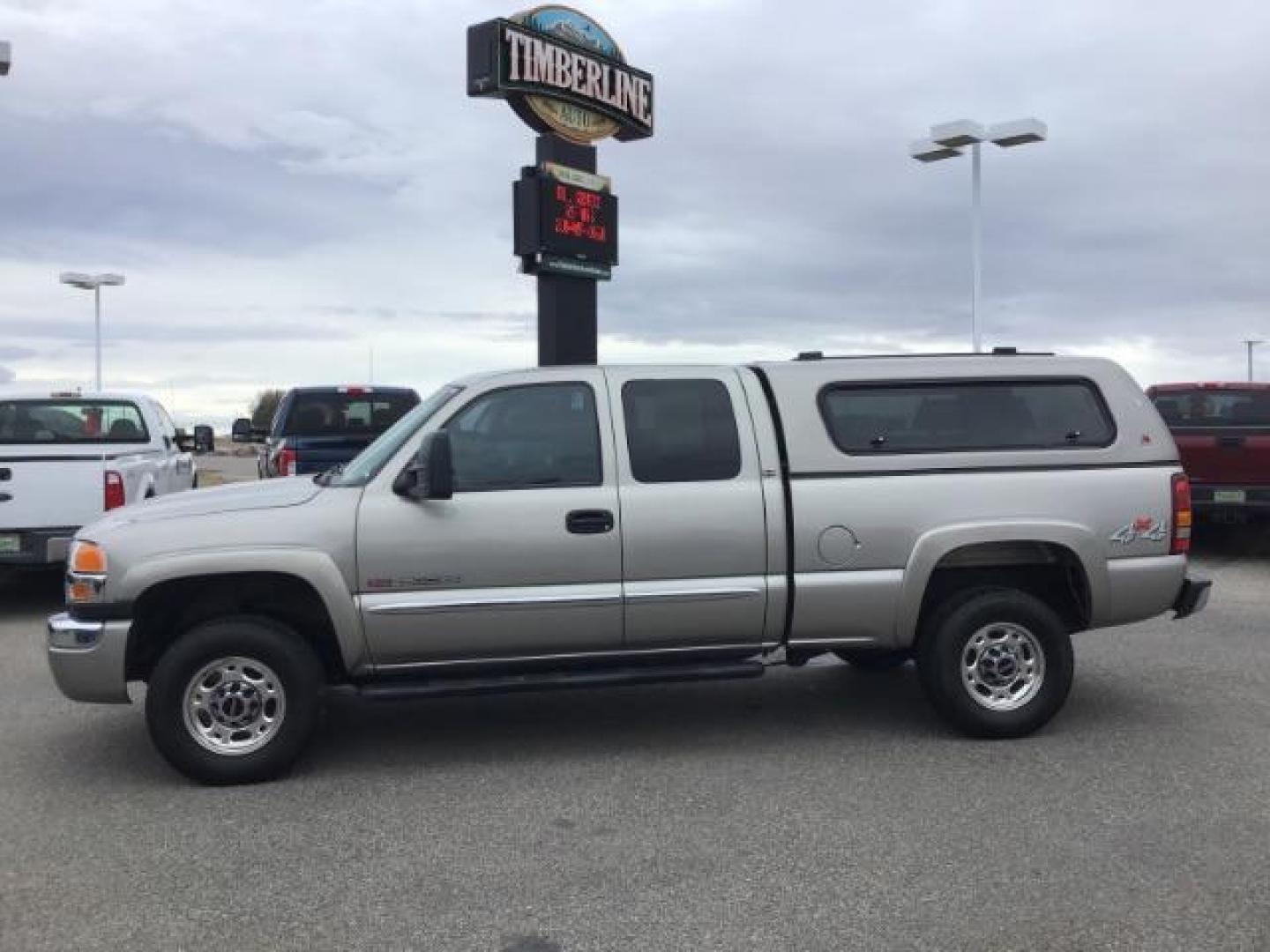 2003 Pewter Metallic /Dark Pewter Custom Cloth Interior GMC Sierra 2500HD SLE Ext. Cab Short Bed 4WD (1GTHK29G93E) with an 8.1L V8 OHV 16V engine, 4-Speed Automatic transmission, located at 1235 N Woodruff Ave., Idaho Falls, 83401, (208) 523-1053, 43.507172, -112.000488 - This 2003 GMC 2500 SLE 4x4, has the 8.1L V8 motor. It only has 80,000 miles. Comes with cloth interior, power windows power locks, cruise control, cruise control, and AM/FM CD stereo. At Timberline Auto it is always easy to find a great deal on your next vehicle! Our experienced sales staff can help - Photo#1