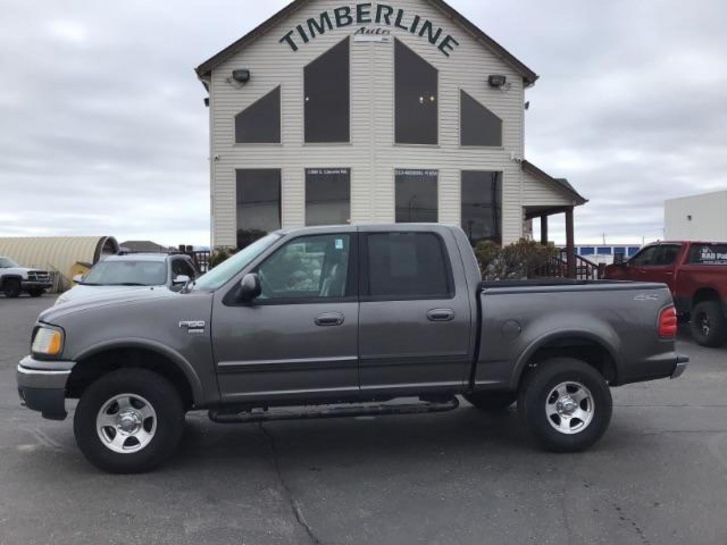 2002 Oxford White /Medium Graphite Cloth Interior Ford F-150 XLT SuperCrew Short Bed 4WD (1FTRW08L02K) with an 5.4L V8 SOHC 16V engine, 4-Speed Automatic transmission, located at 1235 N Woodruff Ave., Idaho Falls, 83401, (208) 523-1053, 43.507172, -112.000488 - This 2002 Ford F150 4x4 XLT, has 151,000 miles. Comes with cloth interior, cruise control, power drivers seat, AM/FM CD stereo, and power windows. At Timberline Auto it is always easy to find a great deal on your next vehicle! Our experienced sales staff can help find the right vehicle will fit your - Photo#1