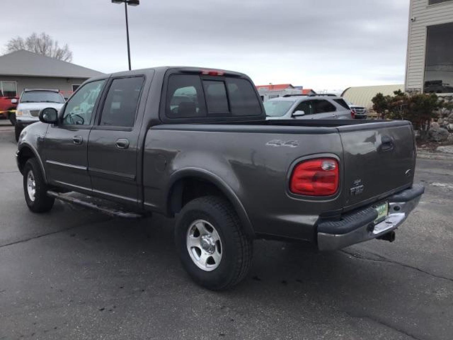 2002 Oxford White /Medium Graphite Cloth Interior Ford F-150 XLT SuperCrew Short Bed 4WD (1FTRW08L02K) with an 5.4L V8 SOHC 16V engine, 4-Speed Automatic transmission, located at 1235 N Woodruff Ave., Idaho Falls, 83401, (208) 523-1053, 43.507172, -112.000488 - This 2002 Ford F150 4x4 XLT, has 151,000 miles. Comes with cloth interior, cruise control, power drivers seat, AM/FM CD stereo, and power windows. At Timberline Auto it is always easy to find a great deal on your next vehicle! Our experienced sales staff can help find the right vehicle will fit your - Photo#2